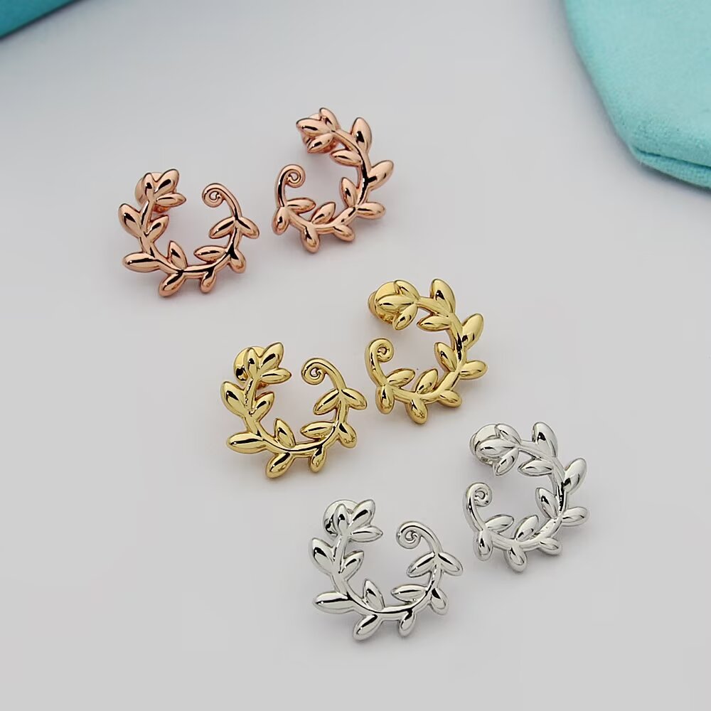 Tiffany Olive Leaf earrings 18k yellow gold no gemstones 15mm diameter