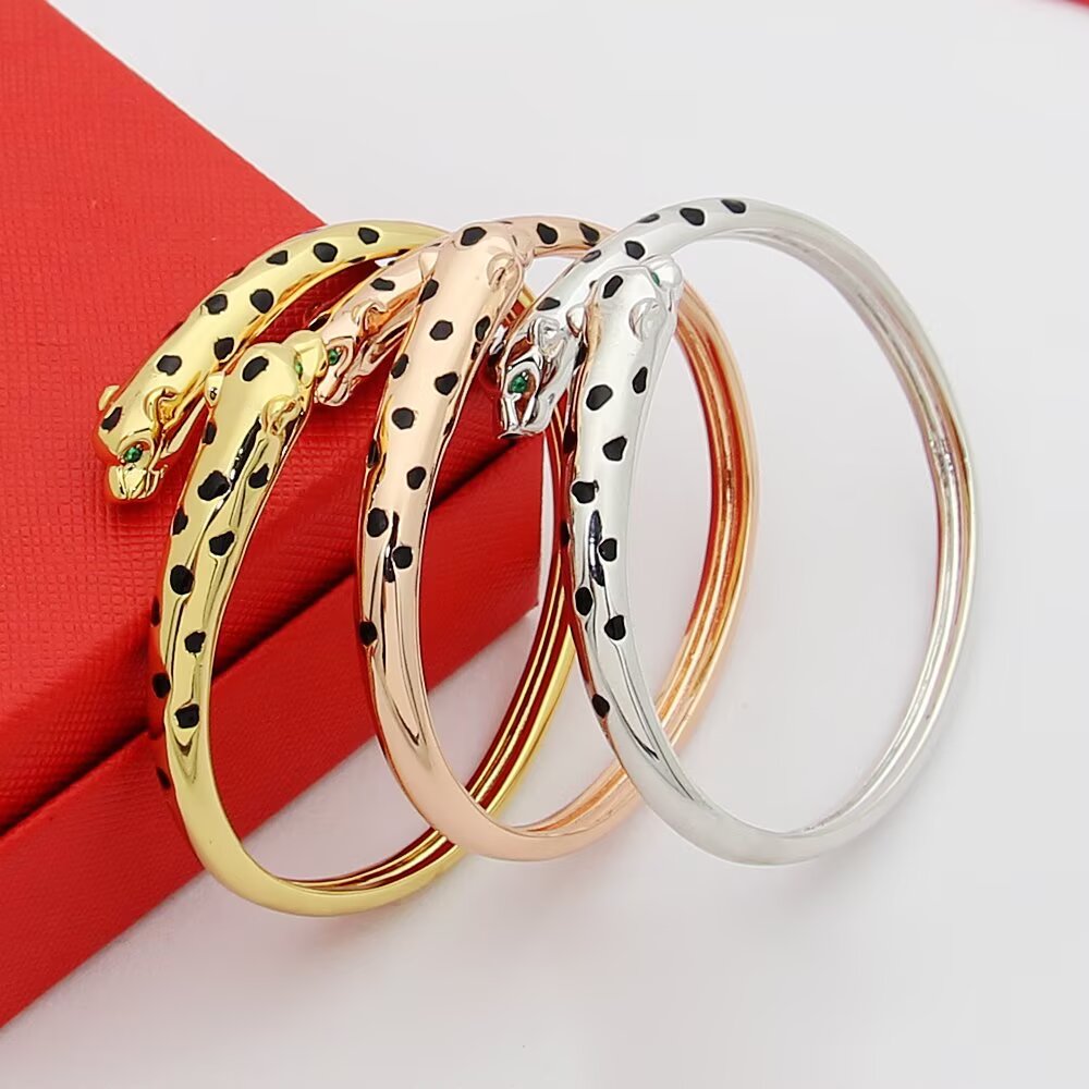 Cartier Panthere de Cartier Double-Headed Panther Bracelet bracelet 18k rose gold with black lacquer spots tsavorite garnet eyes onyx nose accents 17cm