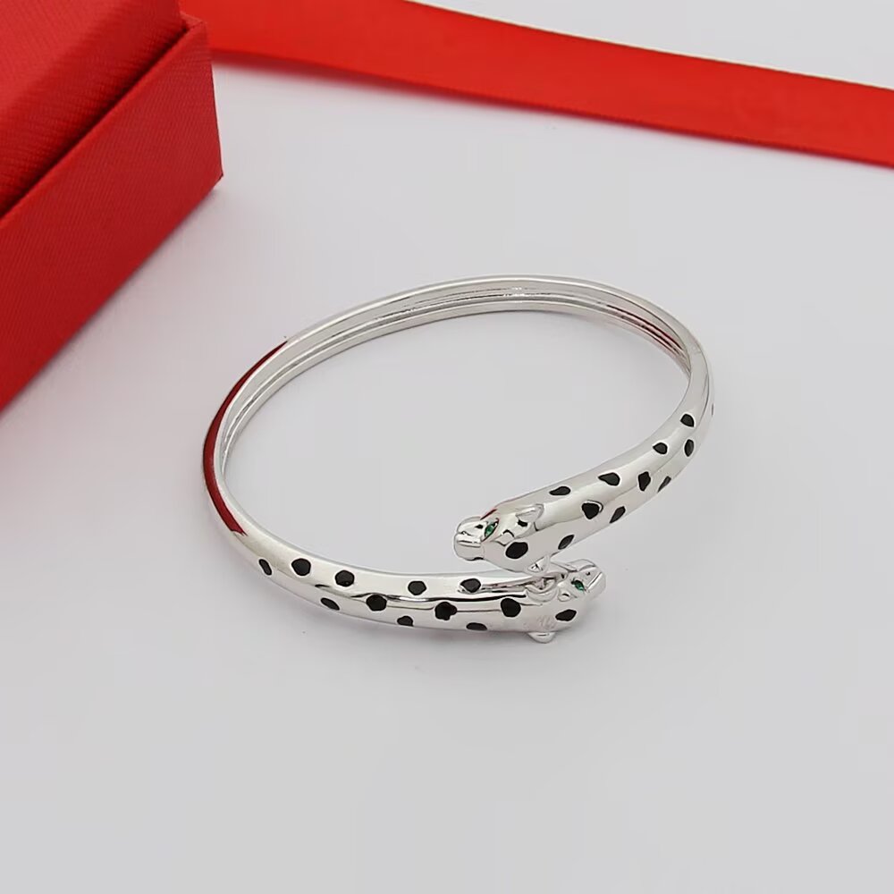 Cartier Panthere de Cartier Double-Headed Panther Bracelet bracelet 18k rose gold with black lacquer spots tsavorite garnet eyes onyx nose accents 17cm