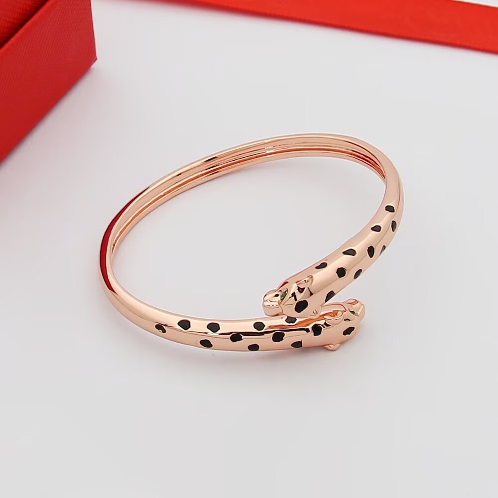 Cartier Panthere de Cartier Double-Headed Panther Bracelet bracelet 18k rose gold with black lacquer spots tsavorite garnet eyes onyx nose accents 17cm