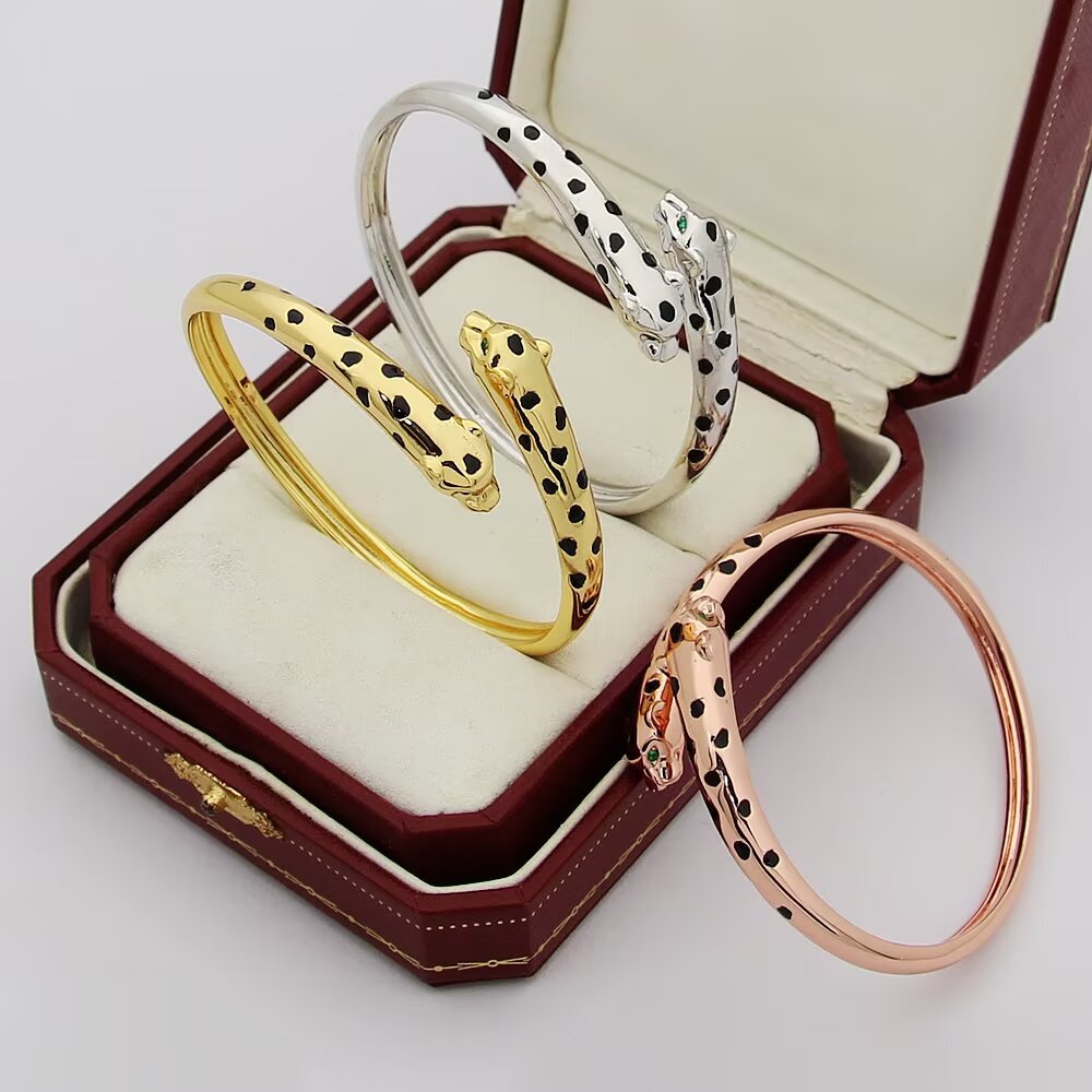 Cartier Panthere de Cartier Double-Headed Panther Bracelet bracelet 18k rose gold with black lacquer spots tsavorite garnet eyes onyx nose accents 17cm