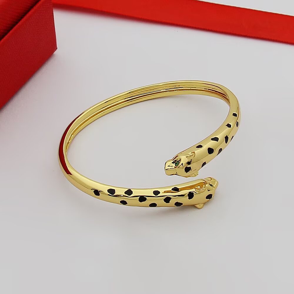 Cartier Panthere de Cartier Double-Headed Panther Bracelet bracelet 18k rose gold with black lacquer spots tsavorite garnet eyes onyx nose accents 17cm