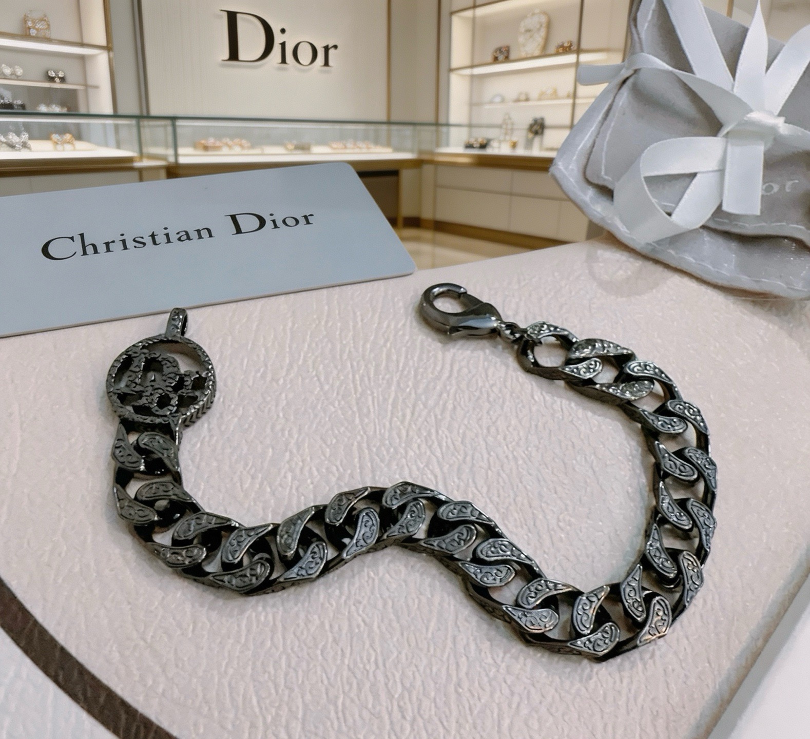 Christian Dior CD Logo Engraved Curb Chain bracelet Gunmetal black ruthenium-toned metal with engraved detailing 19cm