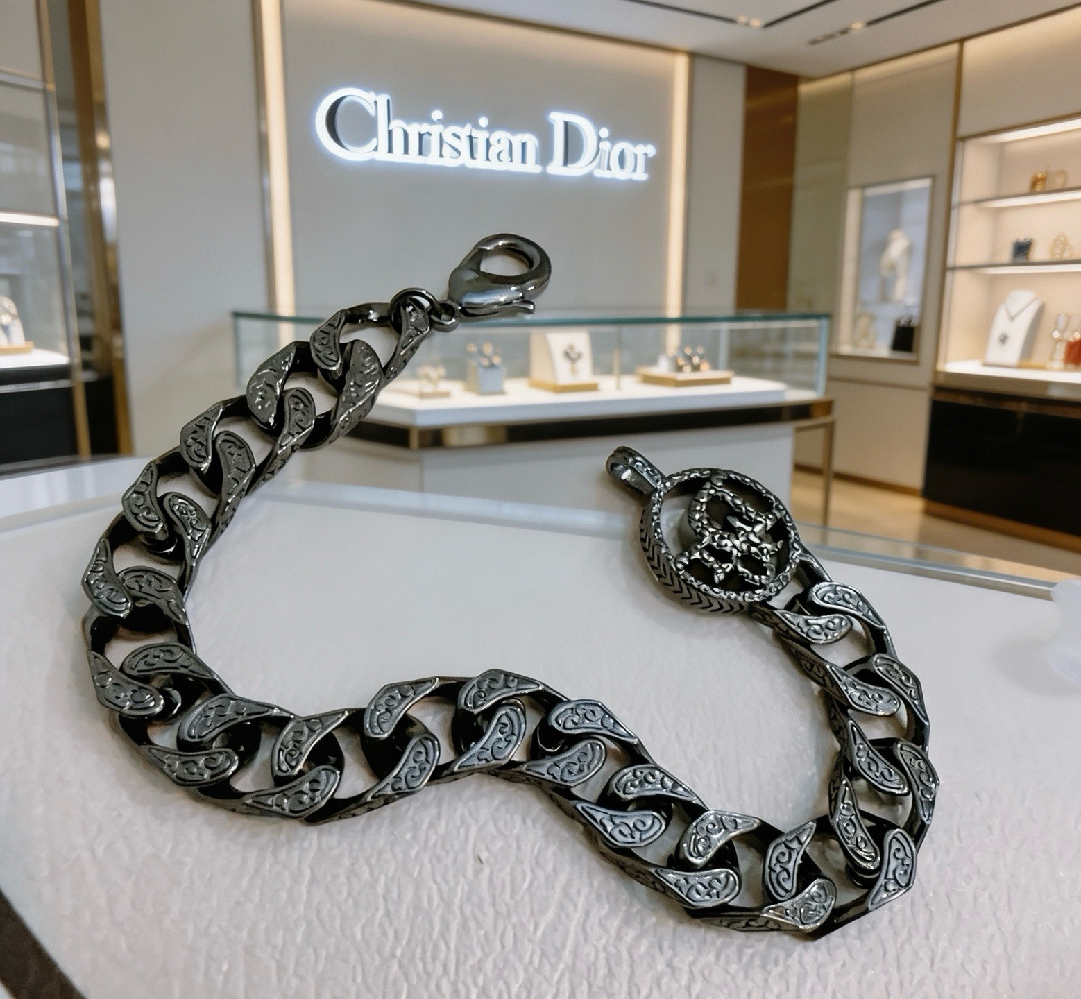 Christian Dior CD Logo Engraved Curb Chain bracelet Gunmetal black ruthenium-toned metal with engraved detailing 19cm