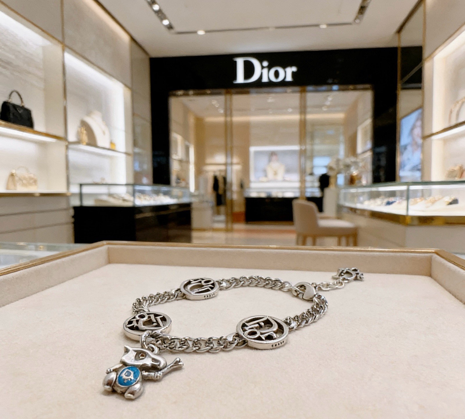 Dior Dior Logo Charm Bracelet with Teddy Bear Charm bracelet Silver-toned metal with blue enamel accent 18cm