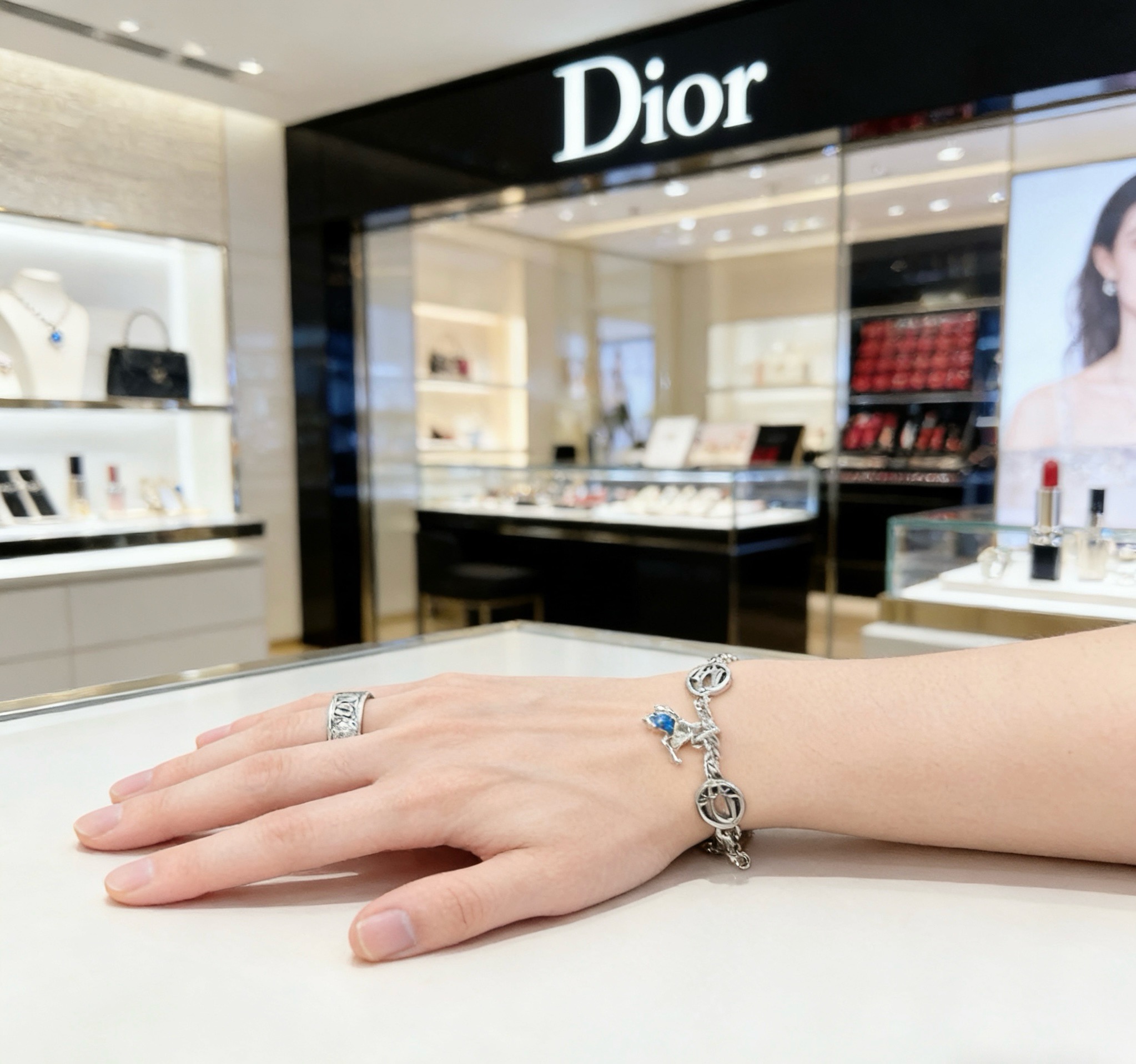 Dior Dior Logo Charm Bracelet with Teddy Bear Charm bracelet Silver-toned metal with blue enamel accent 18cm