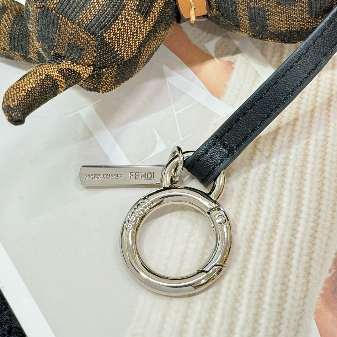 Fendi FF Monogram Dog Bag Charm pendant Tobacco brown and black FF canvas tan leather collar silver-tone metal hardware black enamel accents 10cm charm with 5cm leather strap