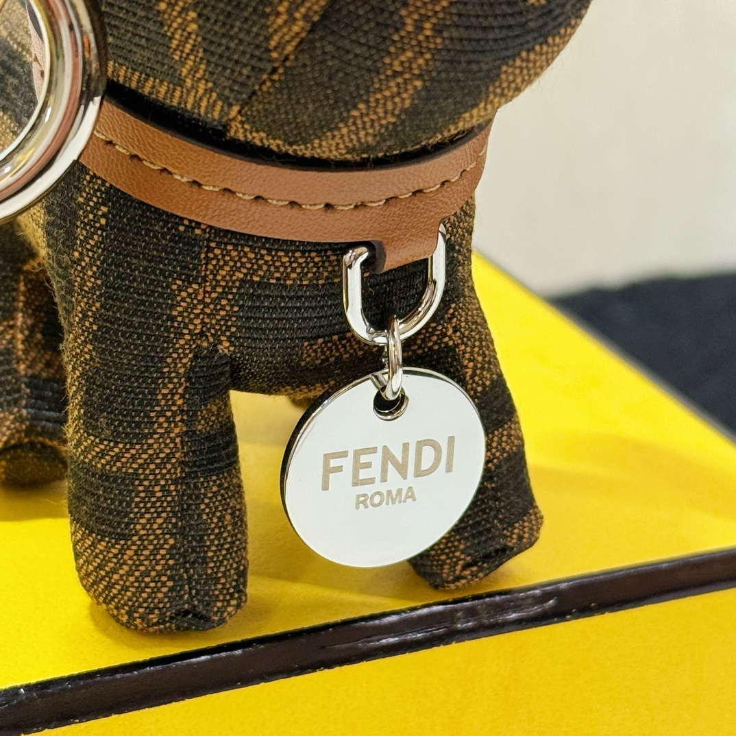 Fendi FF Monogram Dog Bag Charm pendant Tobacco brown and black FF canvas tan leather collar silver-tone metal hardware black enamel accents 10cm charm with 5cm leather strap
