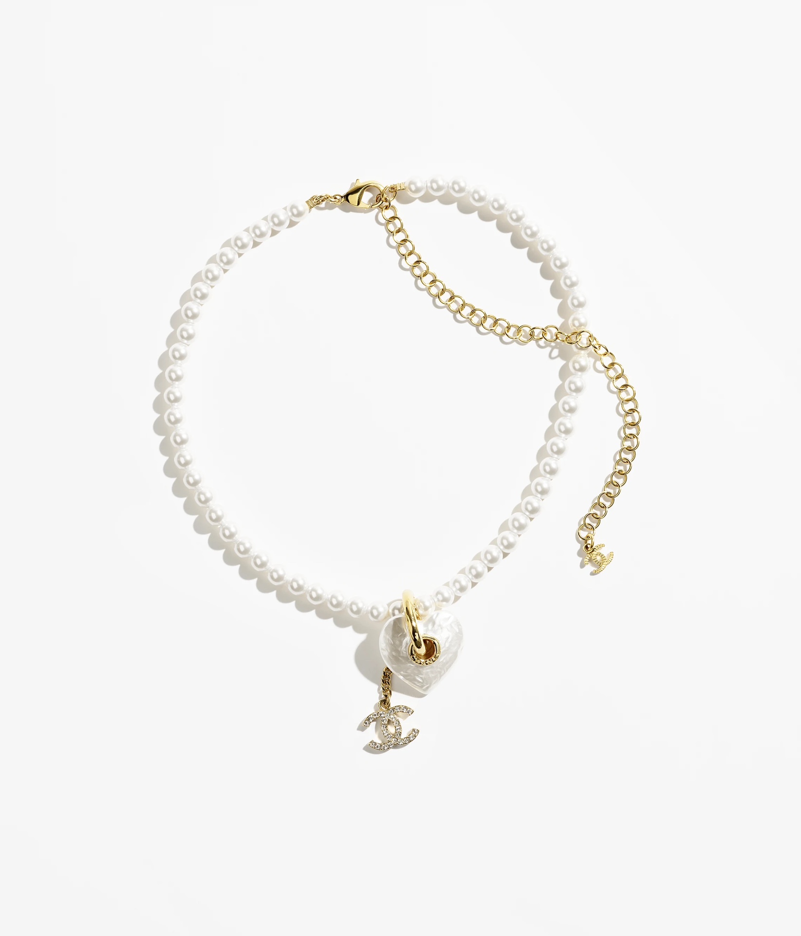 Chanel CC Heart Pearl Pendant Necklace necklace Gold-tone metal white faux pearl clear crystal white mother-of-pearl effect heart charm 40cm with 7cm extender chain
