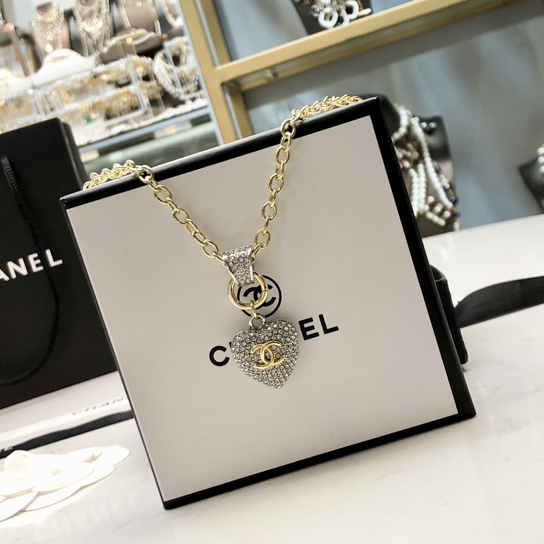 Chanel CC Crystal Heart Pendant necklace gold-tone metal with clear crystal pave 42cm with 5cm extender