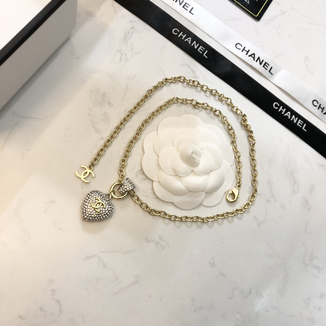 Chanel CC Crystal Heart Pendant necklace gold-tone metal with clear crystal pave 42cm with 5cm extender