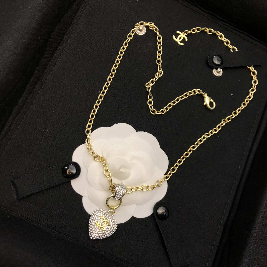 Chanel CC Crystal Heart Pendant necklace gold-tone metal with clear crystal pave 42cm with 5cm extender