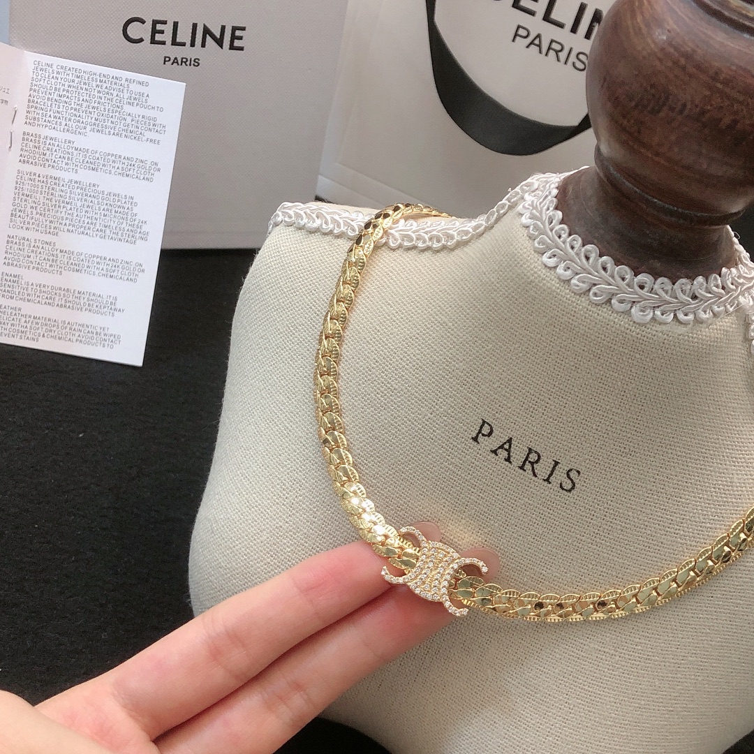 Celine Triomphe necklace gold-tone metal with clear crystal accents silver-tone metal with clear crystal accents 40cm with 5cm extender