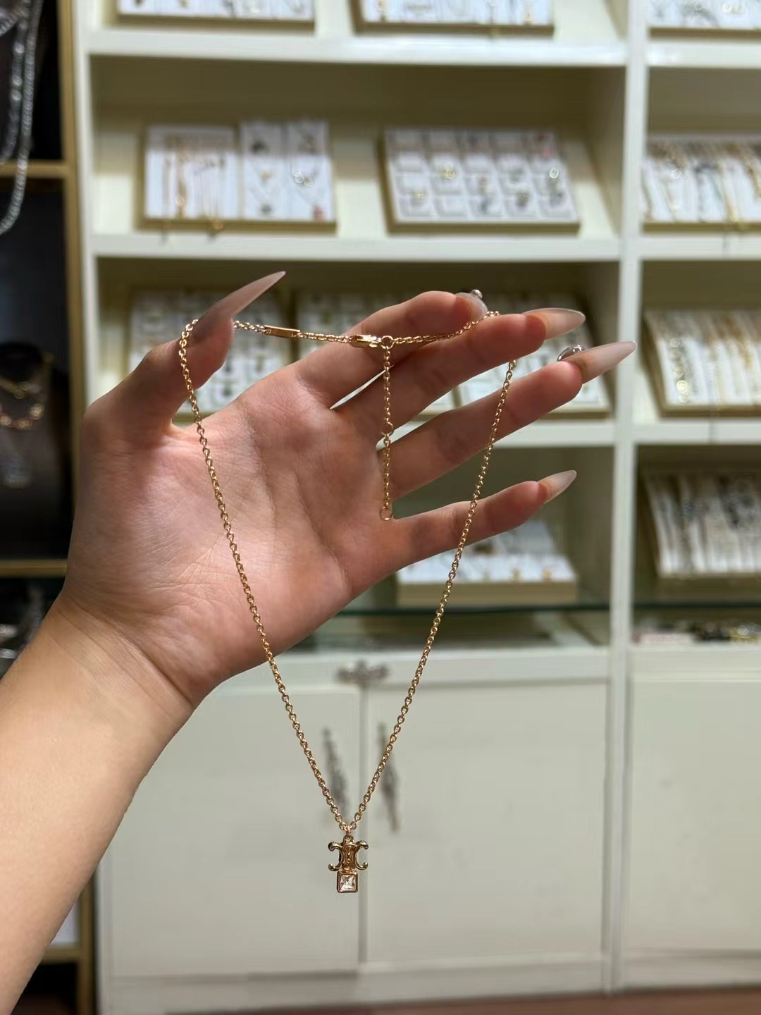 Celine Triomphe Crystal Pendant necklace gold-tone metal with clear faceted crystal 42cm with 5cm extender