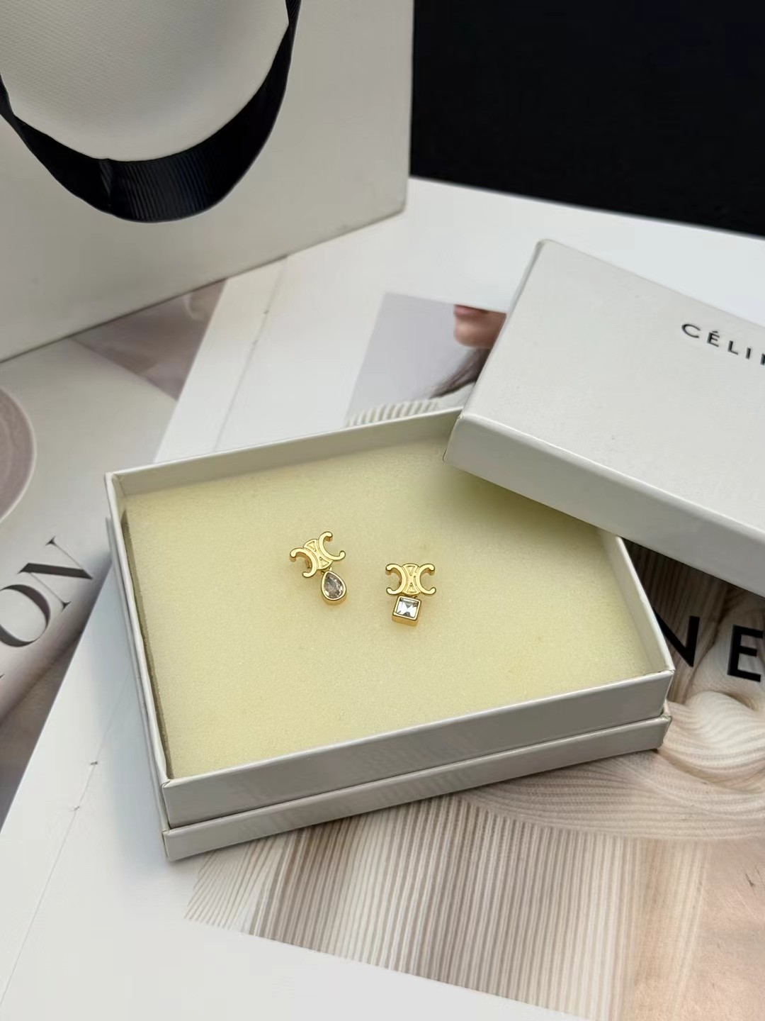 Celine Triomphe Asymmetric Crystal Stud Earrings earrings Gold-tone metal with clear faceted crystals one pear-cut one princess-cut One Size post stud approx 1 2cm drop length