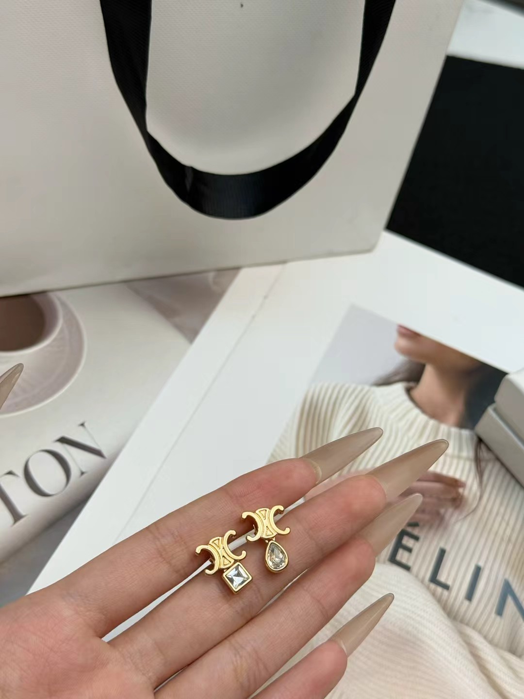 Celine Triomphe Asymmetric Crystal Stud Earrings earrings Gold-tone metal with clear faceted crystals one pear-cut one princess-cut One Size post stud approx 1 2cm drop length