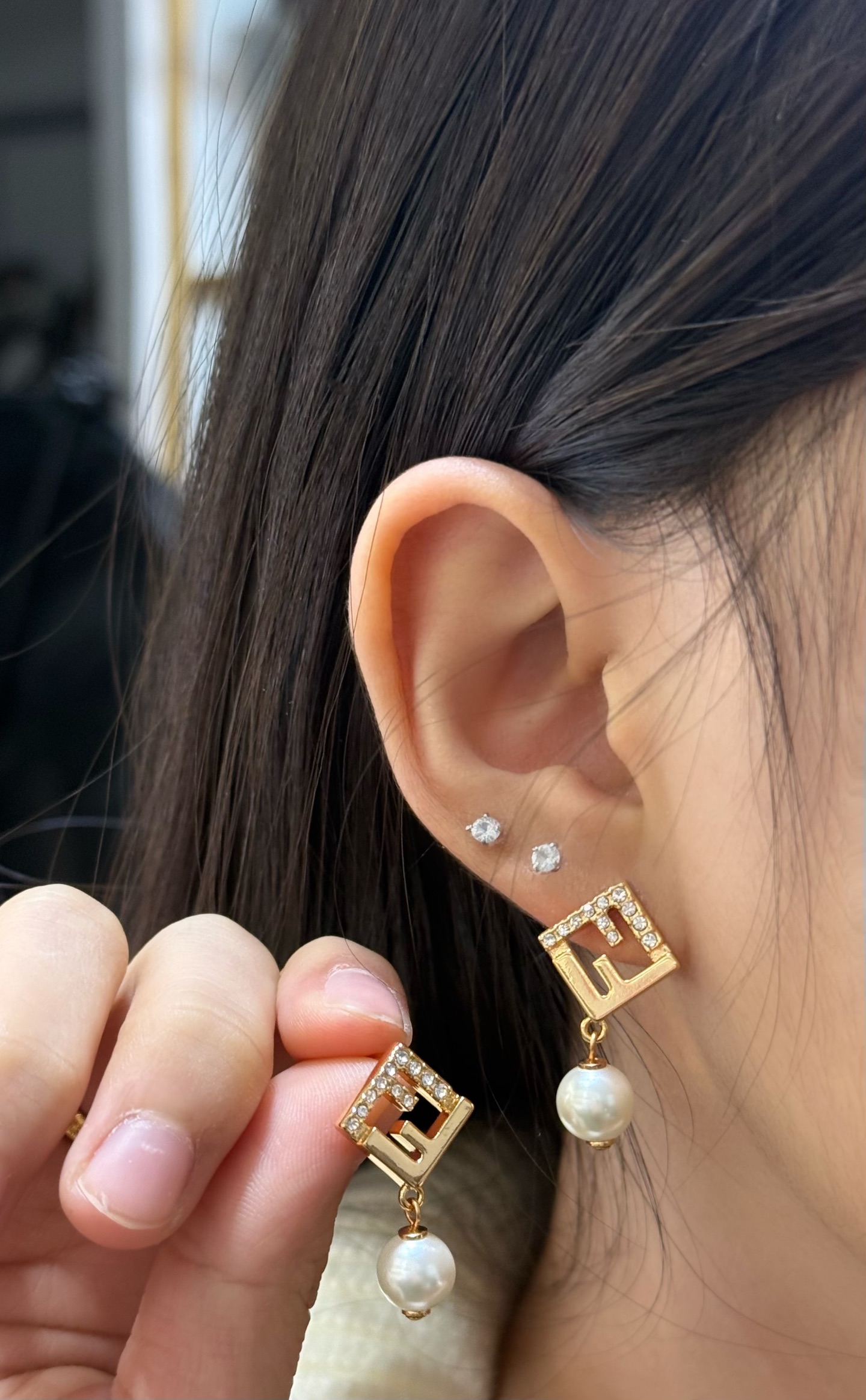 Fendi FF Logo Pearl Drop Earrings earrings Gold-tone metal with clear crystal accents and white pearl drops One size post stud 2cm total drop length