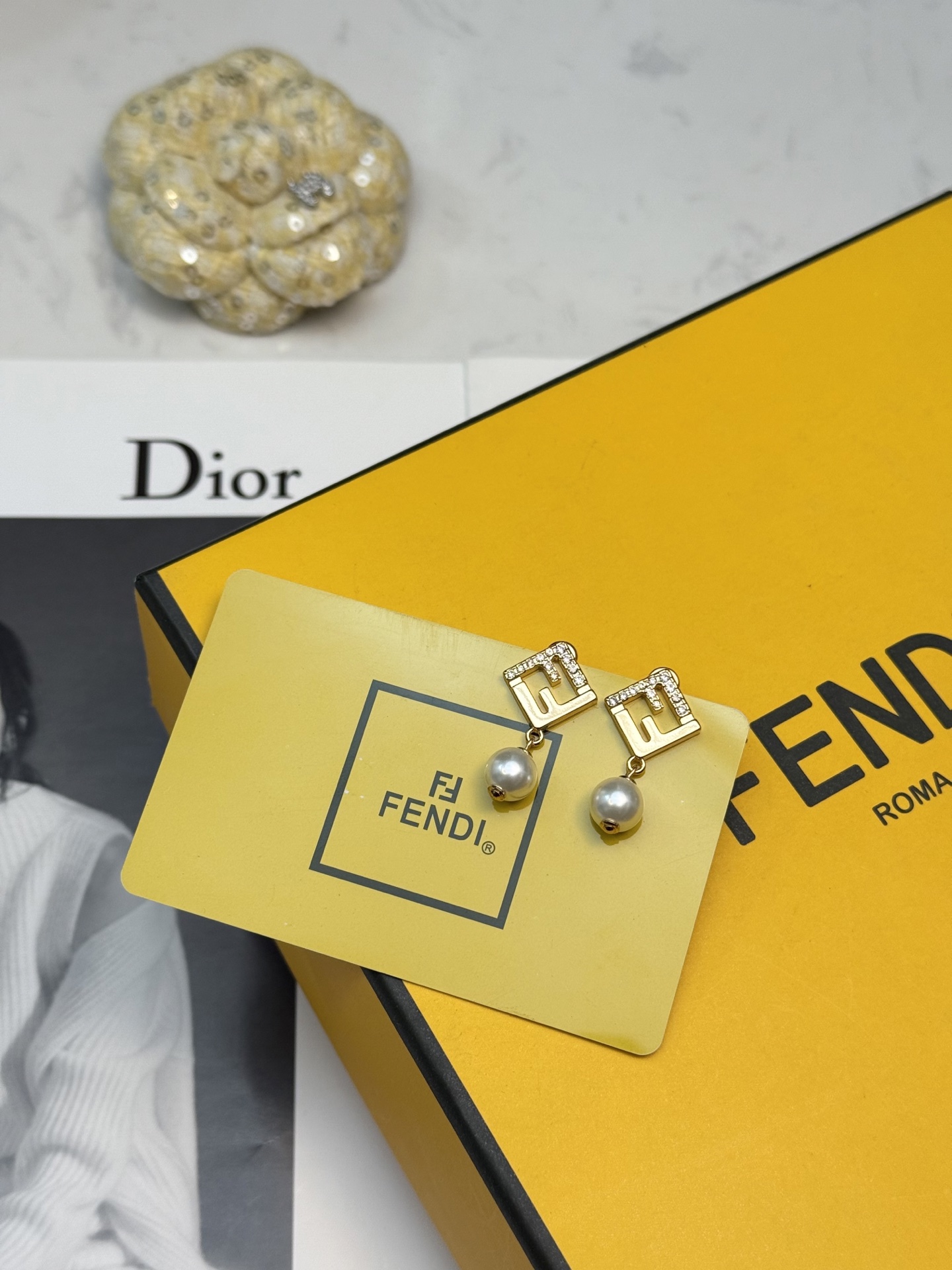 Fendi FF Logo Pearl Drop Earrings earrings Gold-tone metal with clear crystal accents and white pearl drops One size post stud 2cm total drop length
