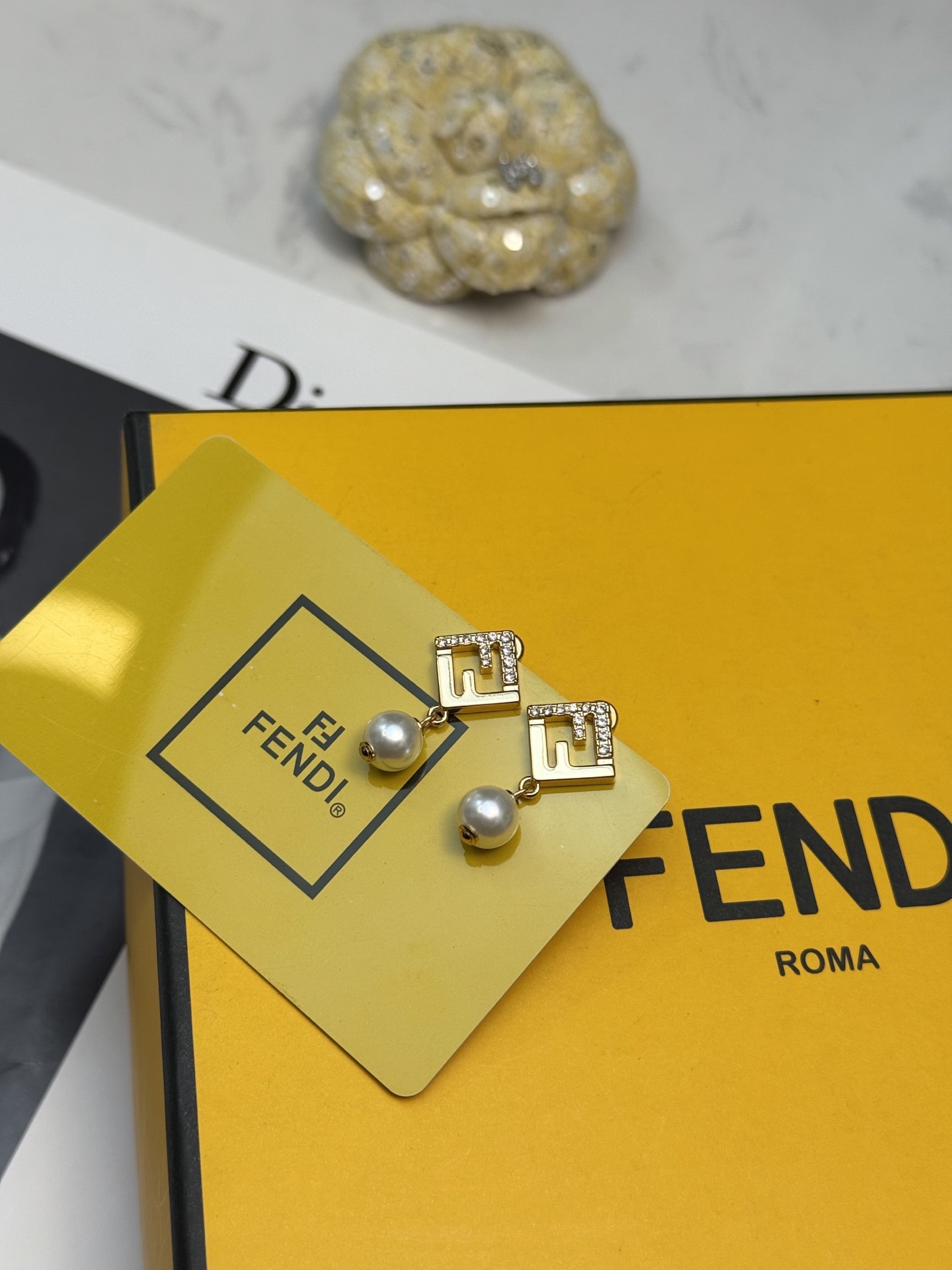 Fendi FF Logo Pearl Drop Earrings earrings Gold-tone metal with clear crystal accents and white pearl drops One size post stud 2cm total drop length