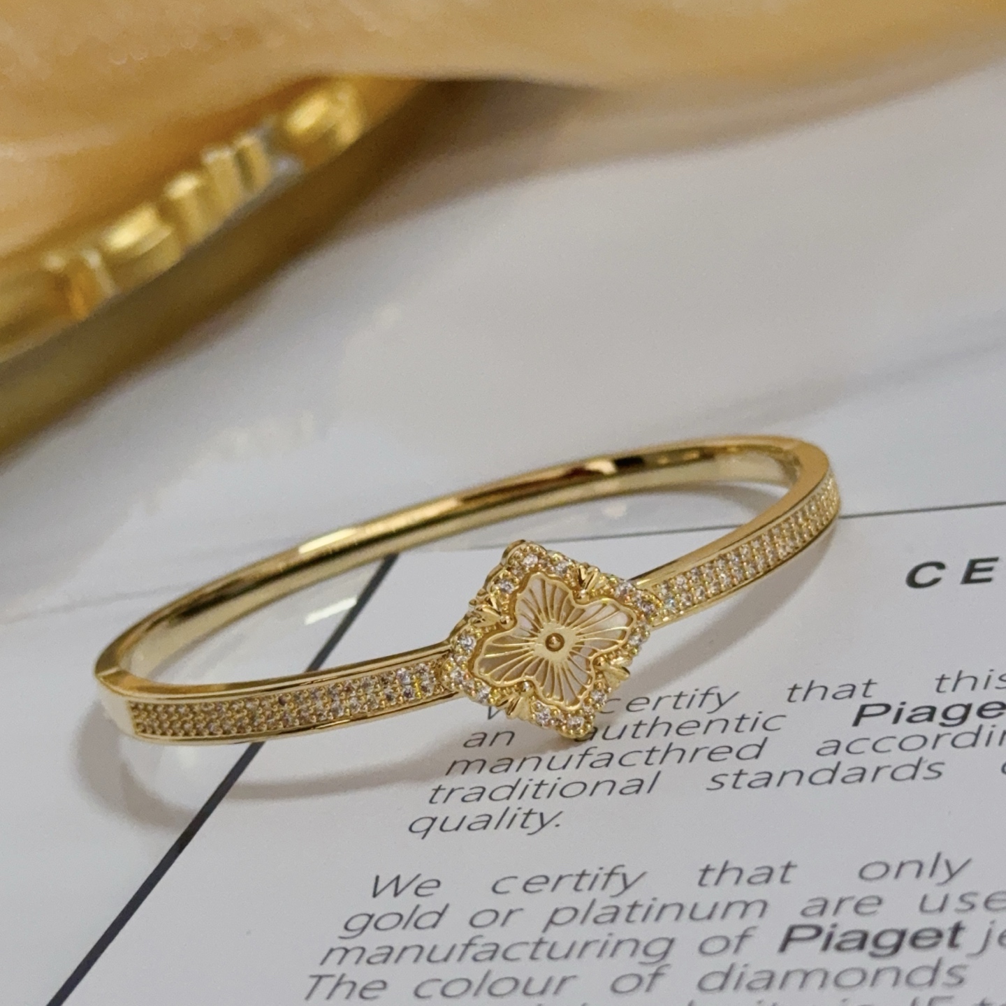 Piaget Rose bracelet Yellow gold with white diamond accents and mother-of-pearl flower detail 17cm