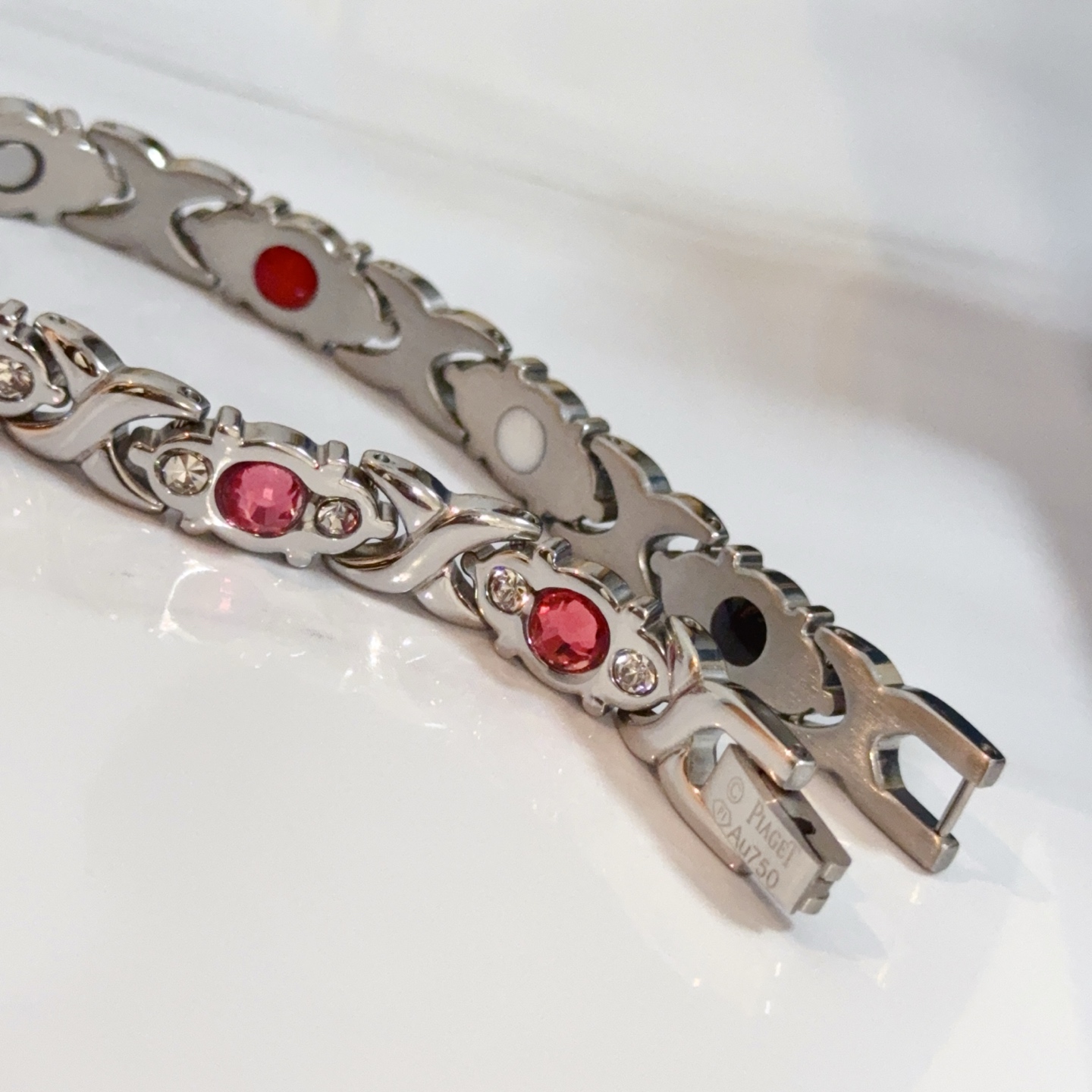 Piaget Magnetic Therapy Link Bracelet bracelet Silver-toned metal with pink gemstones clear accent stones and black white red magnetic inlays 19cm