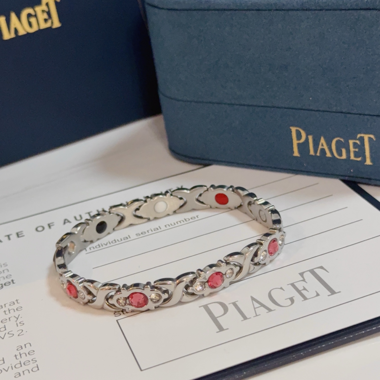 Piaget Magnetic Therapy Link Bracelet bracelet Silver-toned metal with pink gemstones clear accent stones and black white red magnetic inlays 19cm
