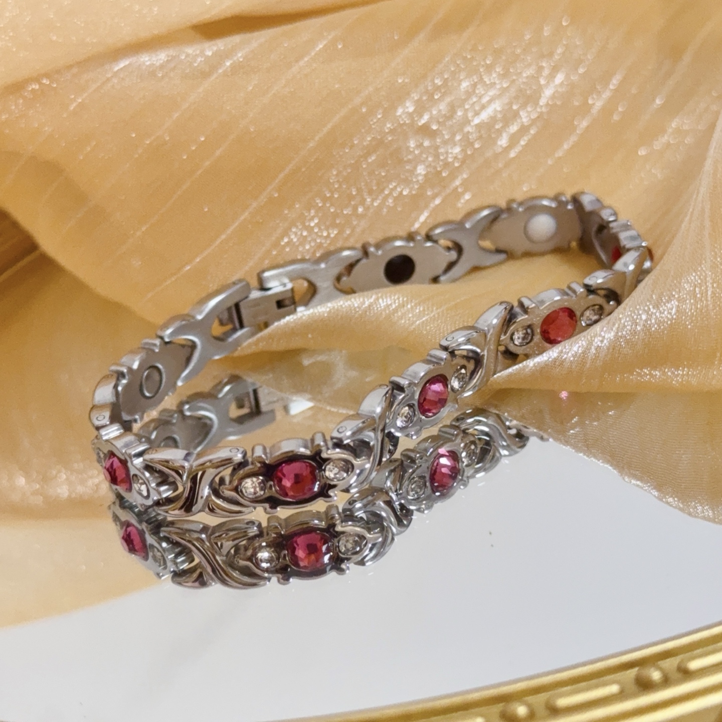 Piaget Magnetic Therapy Link Bracelet bracelet Silver-toned metal with pink gemstones clear accent stones and black white red magnetic inlays 19cm