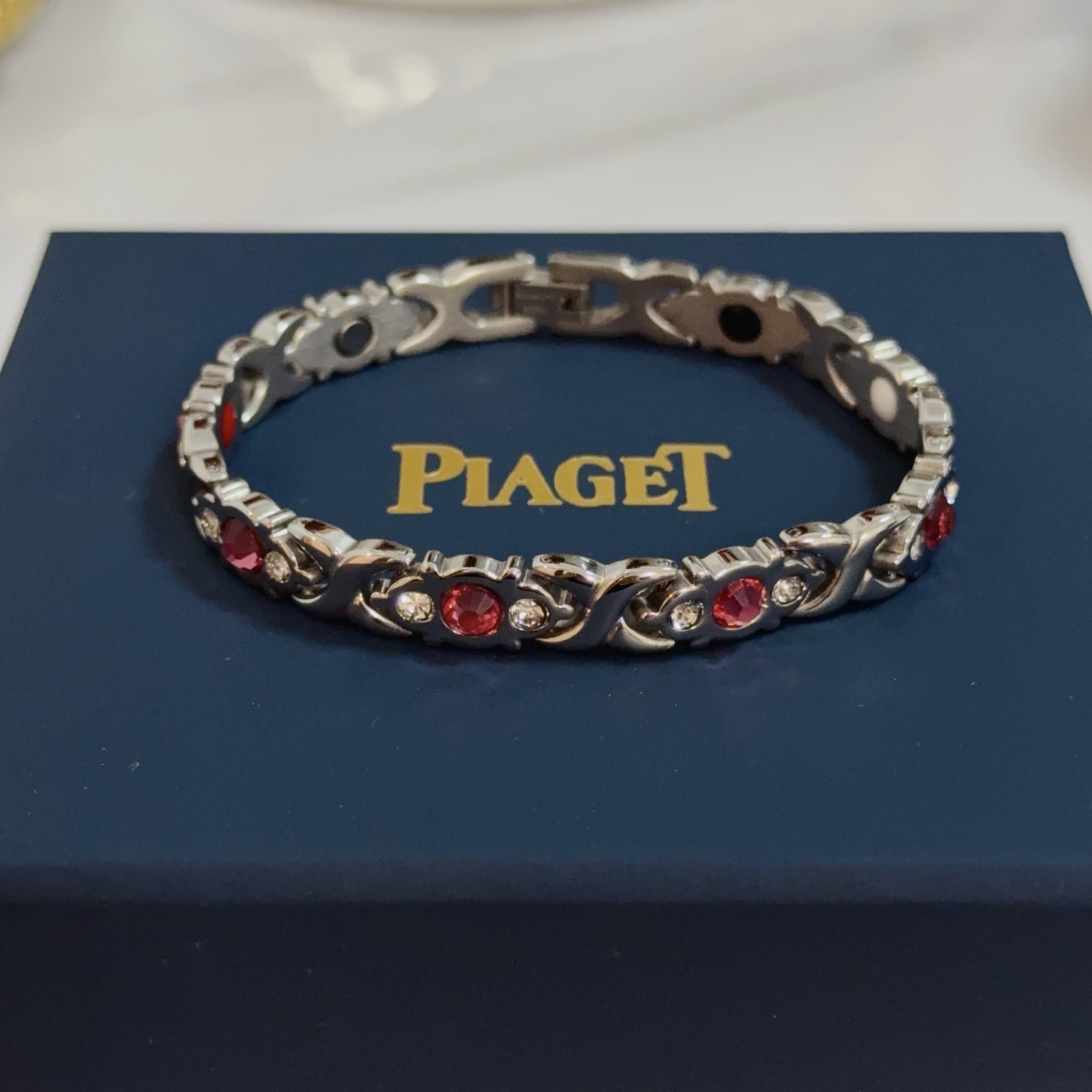 Piaget Magnetic Therapy Link Bracelet bracelet Silver-toned metal with pink gemstones clear accent stones and black white red magnetic inlays 19cm