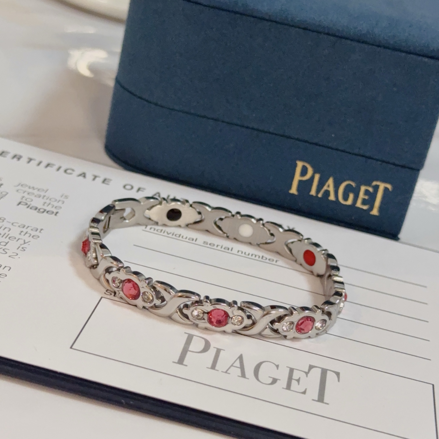 Piaget Magnetic Therapy Link Bracelet bracelet Silver-toned metal with pink gemstones clear accent stones and black white red magnetic inlays 19cm