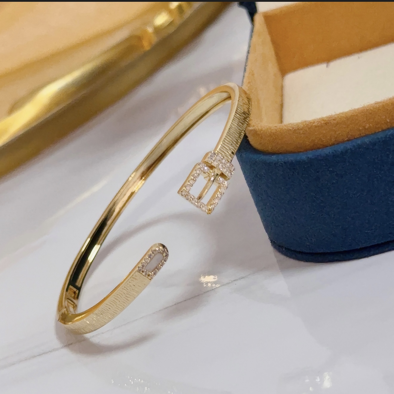 Piaget Possession Buckle Cuff bracelet 18k yellow gold with clear diamond accents and white mother-of-pearl inlay 17cm inner circumference