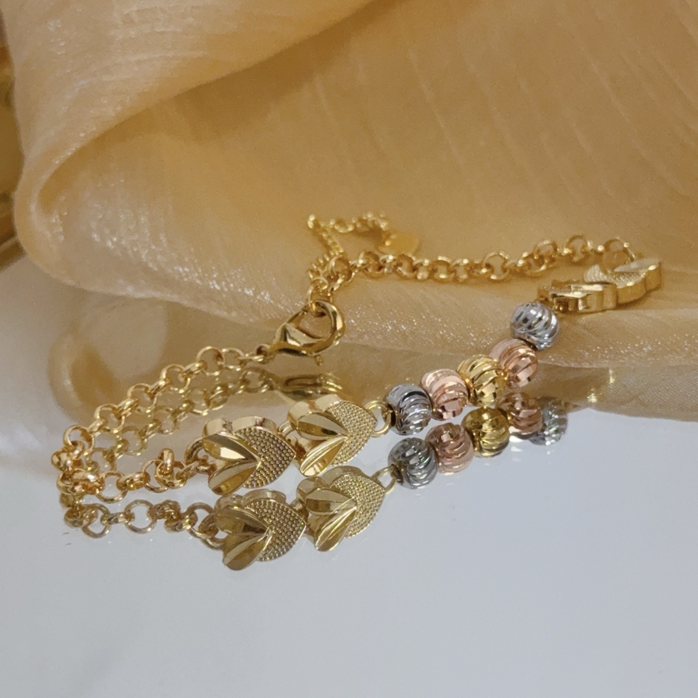 Piaget Possession Heart Motif bracelet Tri-tone yellow gold rose gold white gold metal no gemstones 16cm with 3cm extender chain