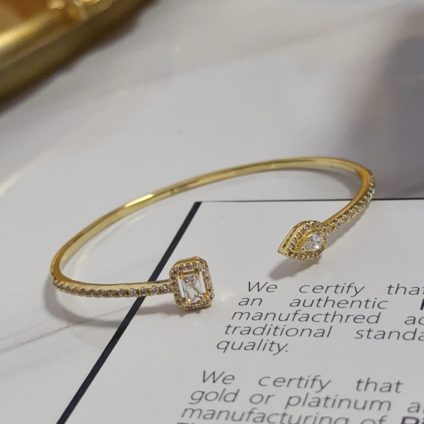 Piaget Possession Open Bangle bracelet 18k yellow gold with clear diamond accents 17cm inner circumference