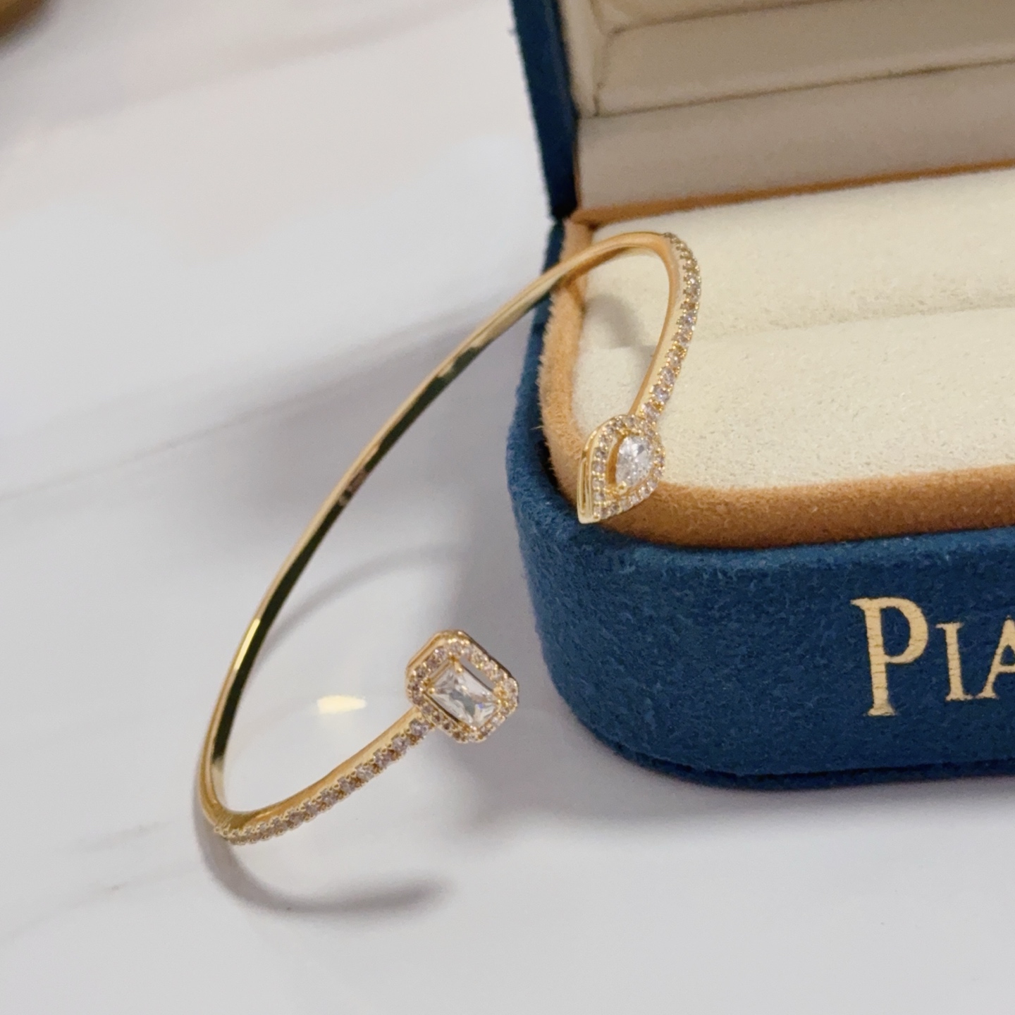 Piaget Possession Open Bangle bracelet 18k yellow gold with clear diamond accents 17cm inner circumference