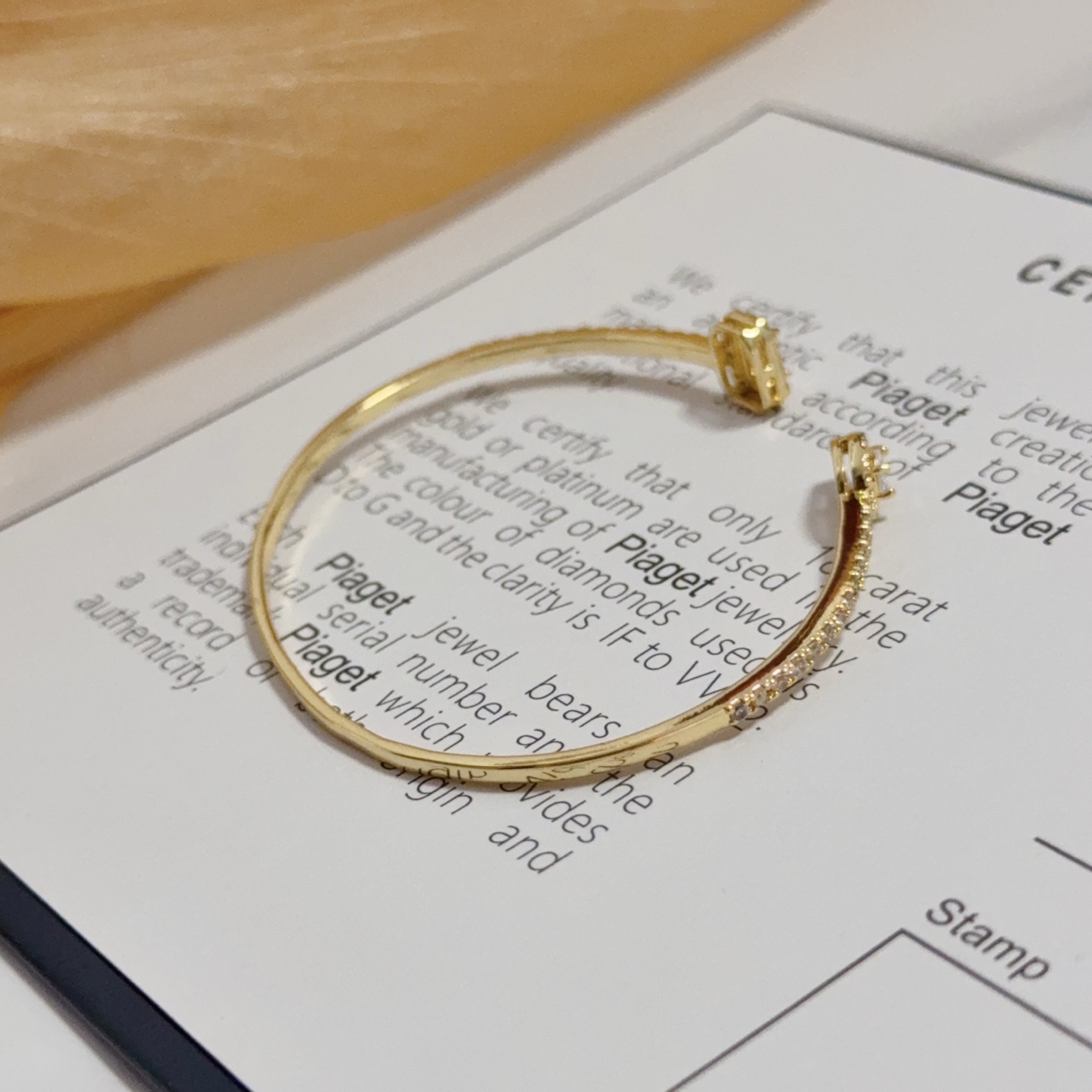 Piaget Possession Open Bangle bracelet 18k yellow gold with clear diamond accents 17cm inner circumference