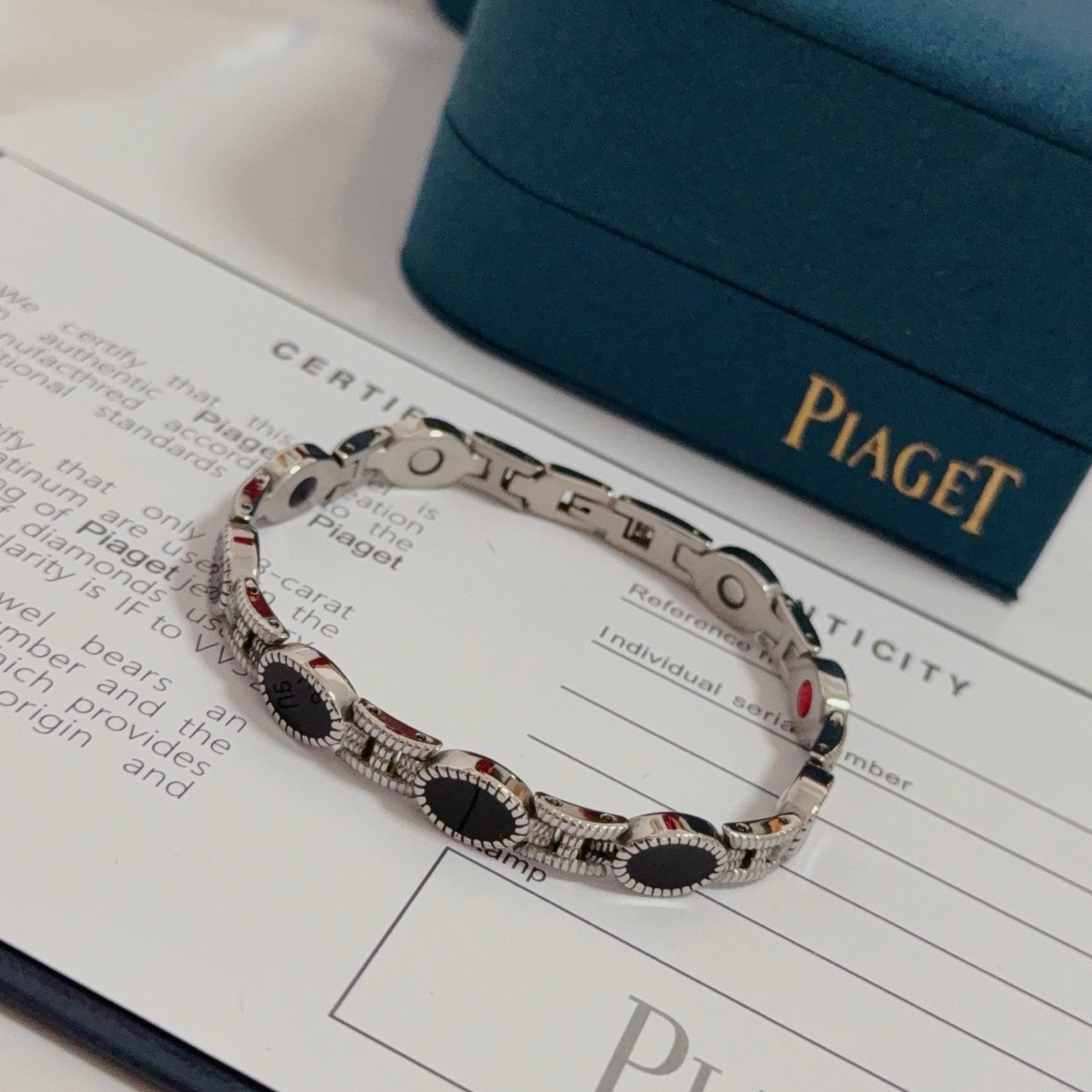 Piaget Magnetic Onyx Link Bracelet bracelet Silver-toned metal with black onyx inlays accented with red and white magnetic element details 19cm