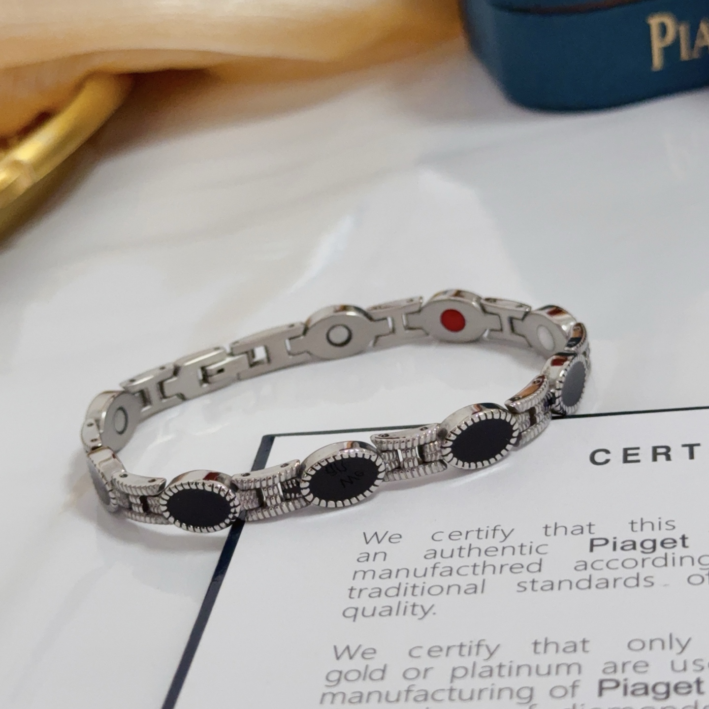 Piaget Magnetic Onyx Link Bracelet bracelet Silver-toned metal with black onyx inlays accented with red and white magnetic element details 19cm