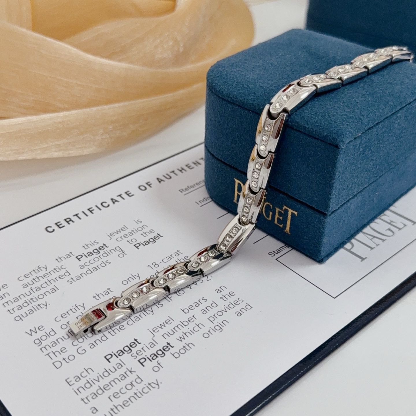 Piaget Au750 Diamond Link Bracelet bracelet Silver-toned 18k white gold with clear round diamonds inner links with black white red accent elements 19cm