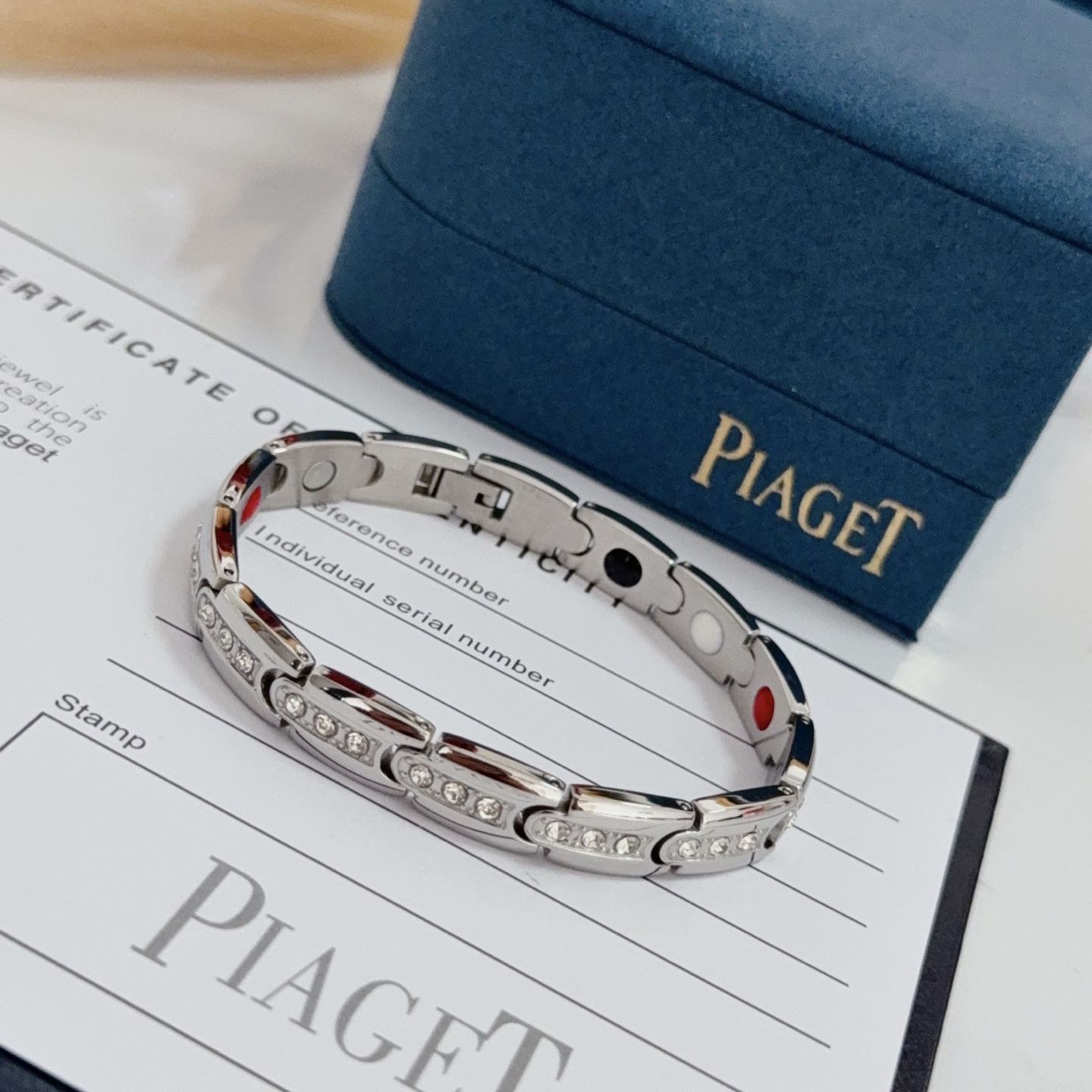 Piaget Au750 Diamond Link Bracelet bracelet Silver-toned 18k white gold with clear round diamonds inner links with black white red accent elements 19cm