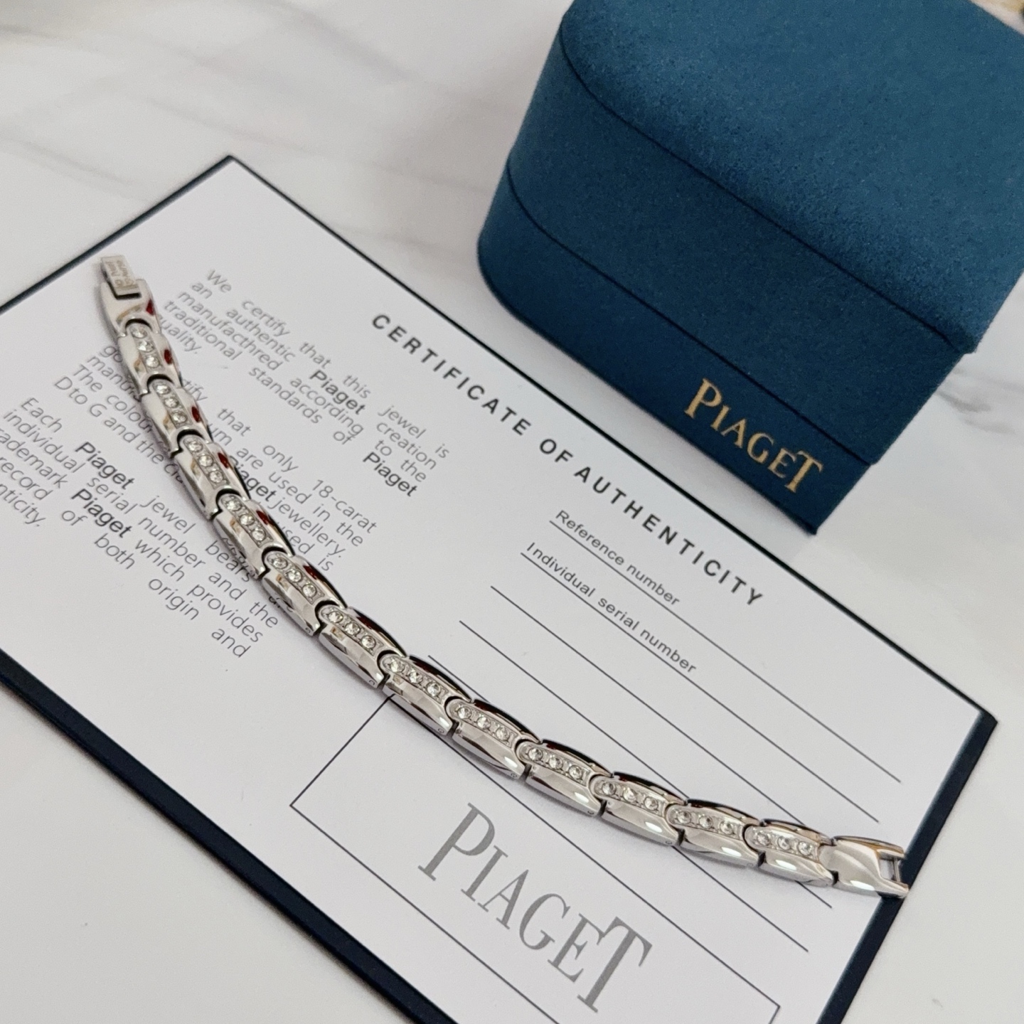 Piaget Au750 Diamond Link Bracelet bracelet Silver-toned 18k white gold with clear round diamonds inner links with black white red accent elements 19cm