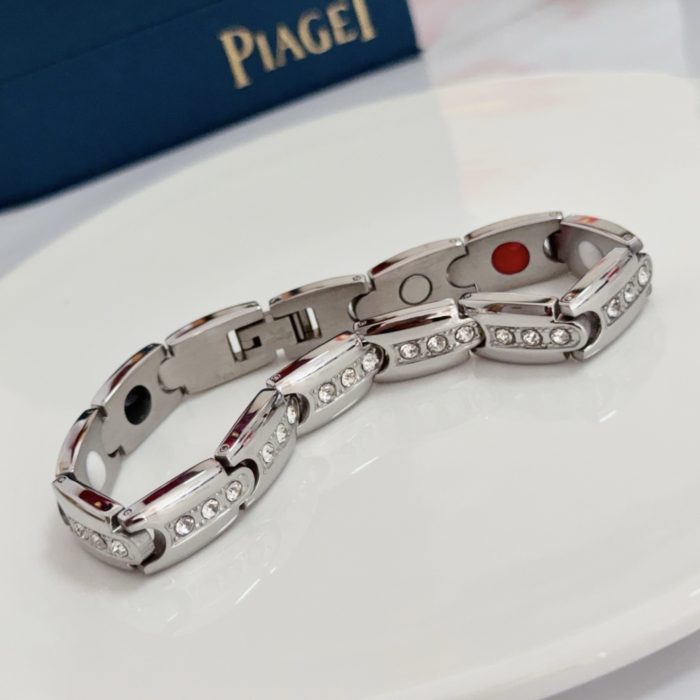 Piaget Au750 Diamond Link Bracelet bracelet Silver-toned 18k white gold with clear round diamonds inner links with black white red accent elements 19cm