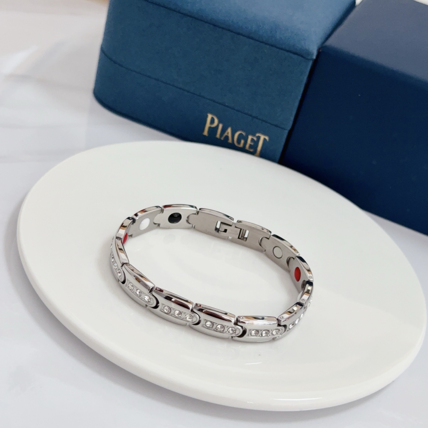 Piaget Au750 Diamond Link Bracelet bracelet Silver-toned 18k white gold with clear round diamonds inner links with black white red accent elements 19cm