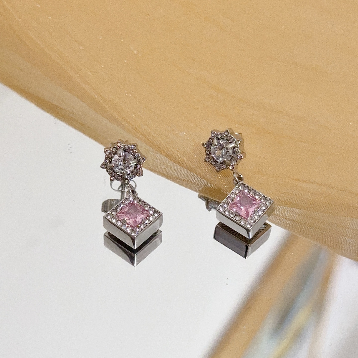 Piaget Sunlight Journey earrings silver-toned white gold with clear diamonds and pink square gemstones 1 5cm drop length