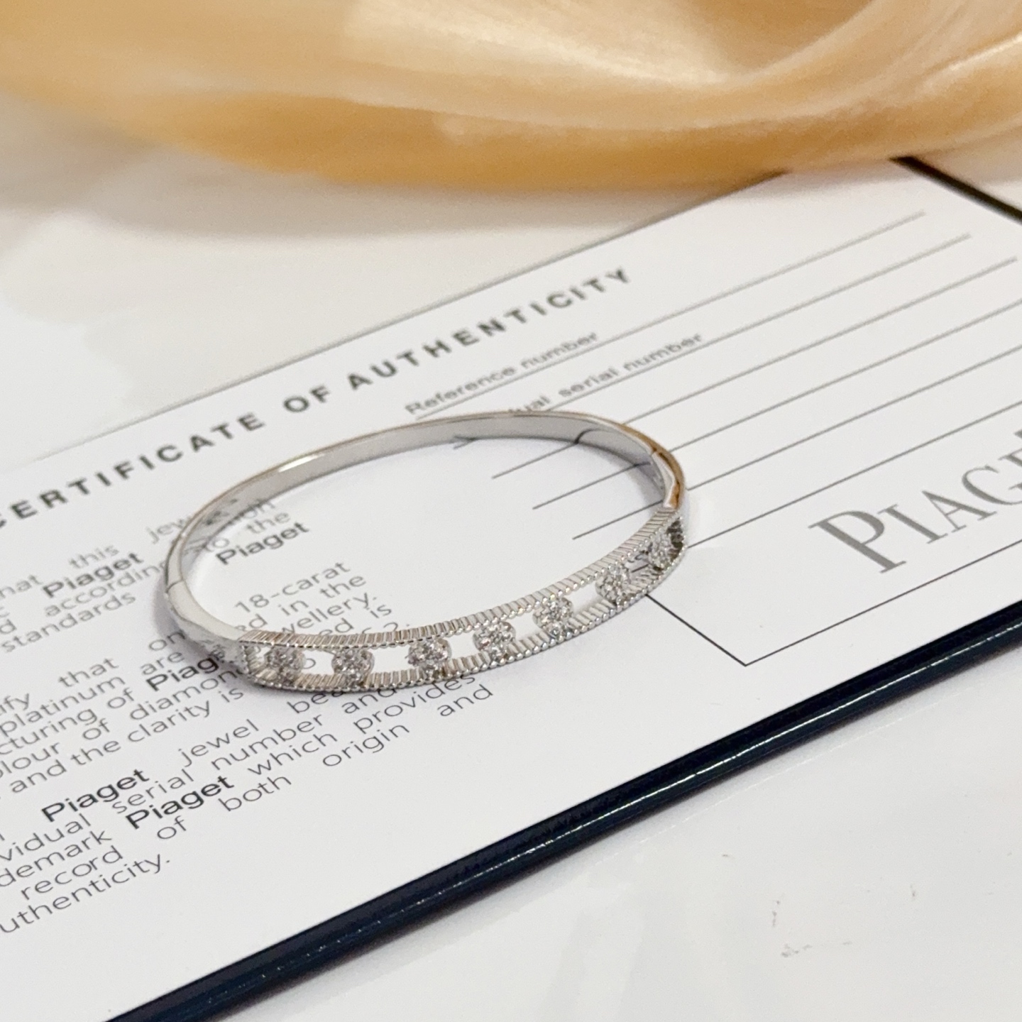 Piaget Possession bracelet 18k white gold with clear diamond accents 17cm inner circumference