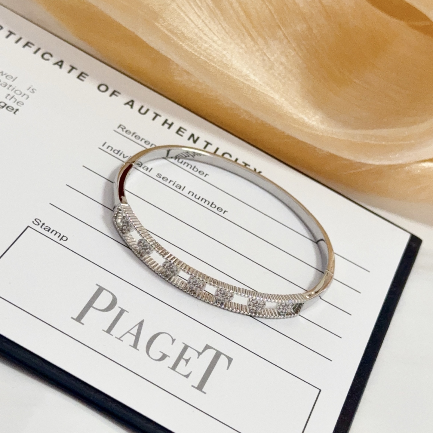 Piaget Possession bracelet 18k white gold with clear diamond accents 17cm inner circumference
