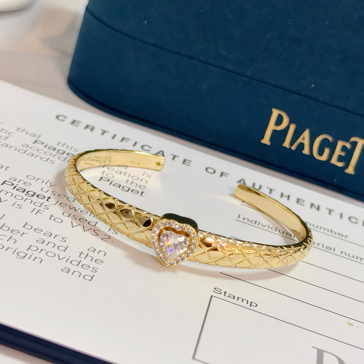 Piaget Heart Diamond Quilted Cuff bracelet 18k yellow gold with clear heart-cut diamond and clear diamond accents 17cm inner circumference