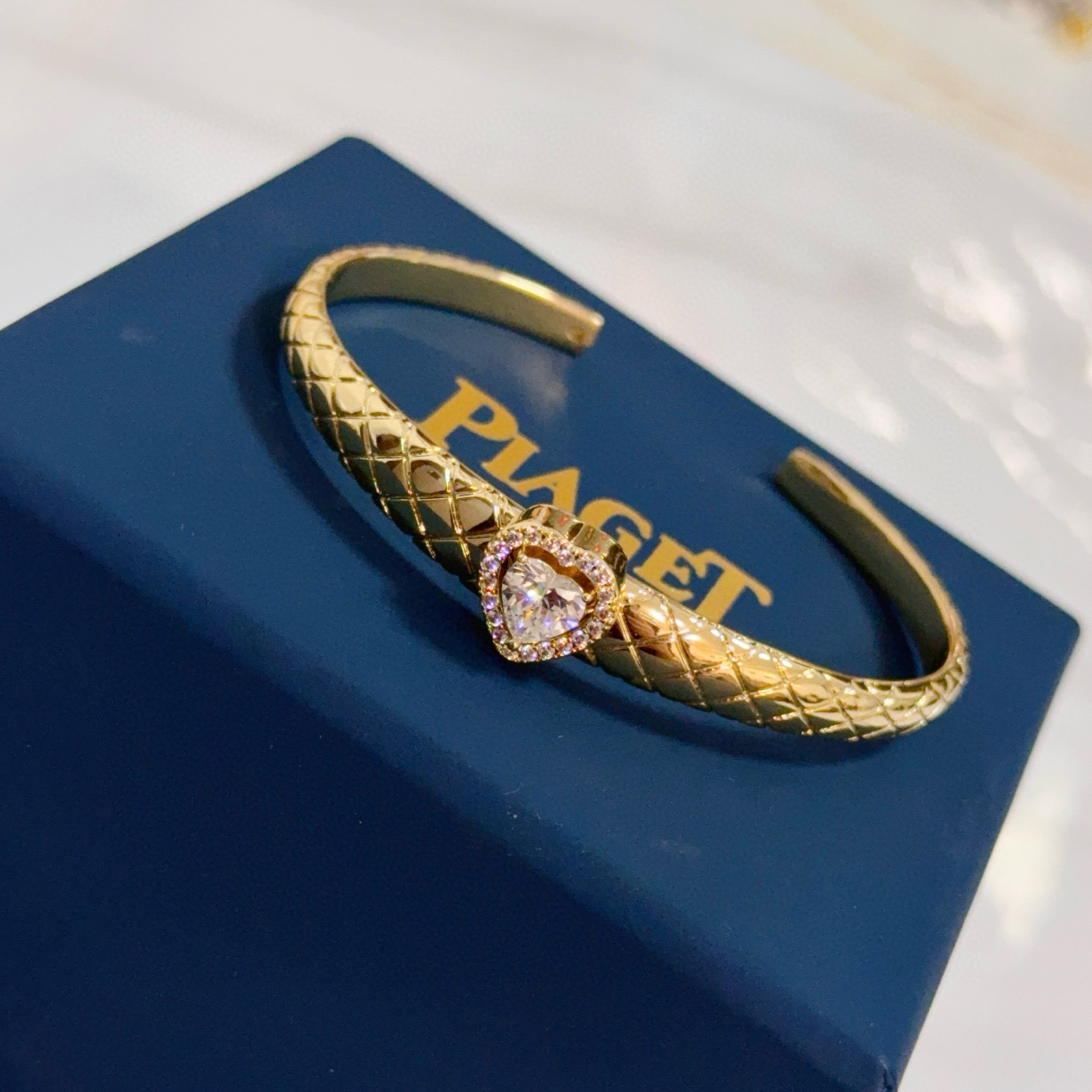 Piaget Heart Diamond Quilted Cuff bracelet 18k yellow gold with clear heart-cut diamond and clear diamond accents 17cm inner circumference