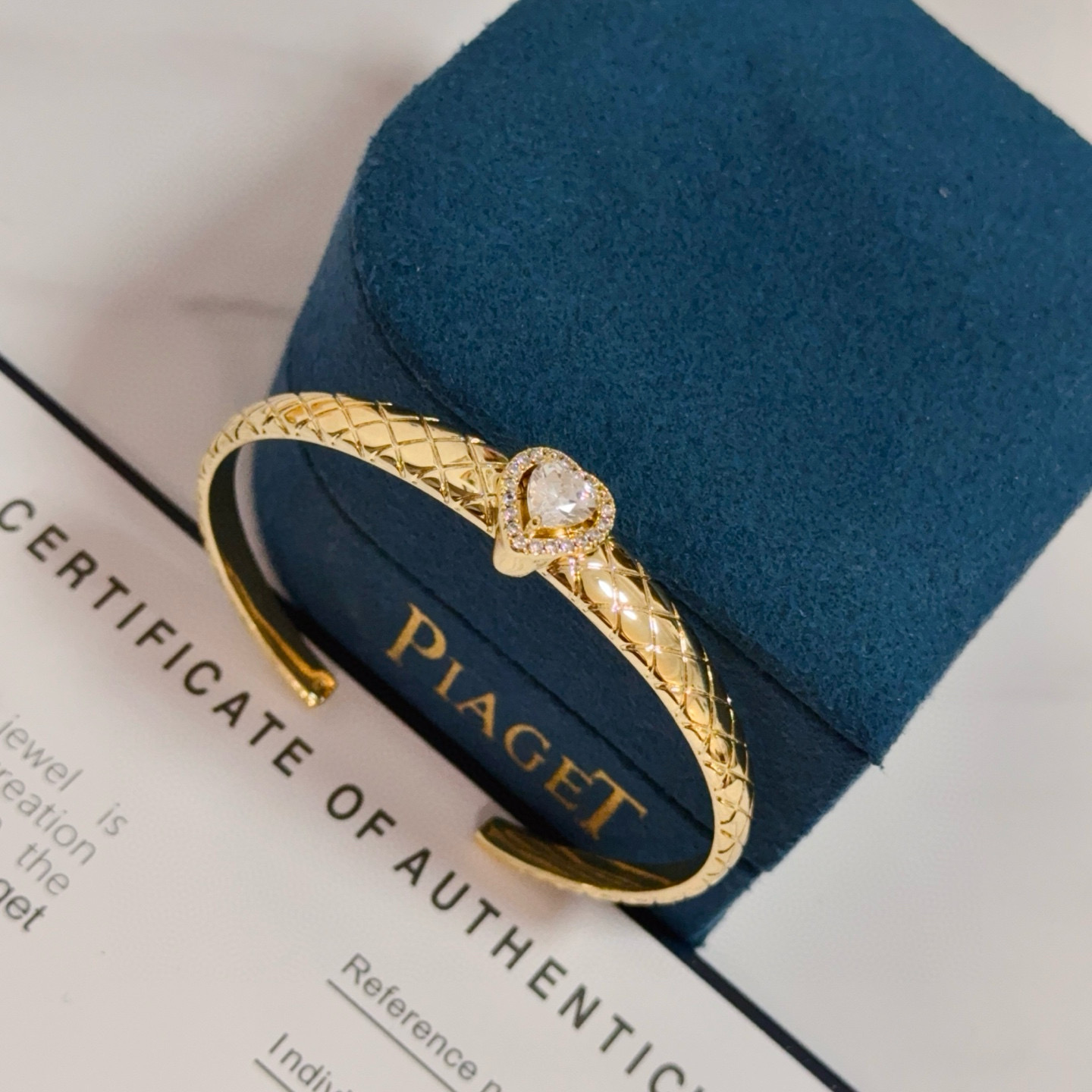 Piaget Heart Diamond Quilted Cuff bracelet 18k yellow gold with clear heart-cut diamond and clear diamond accents 17cm inner circumference