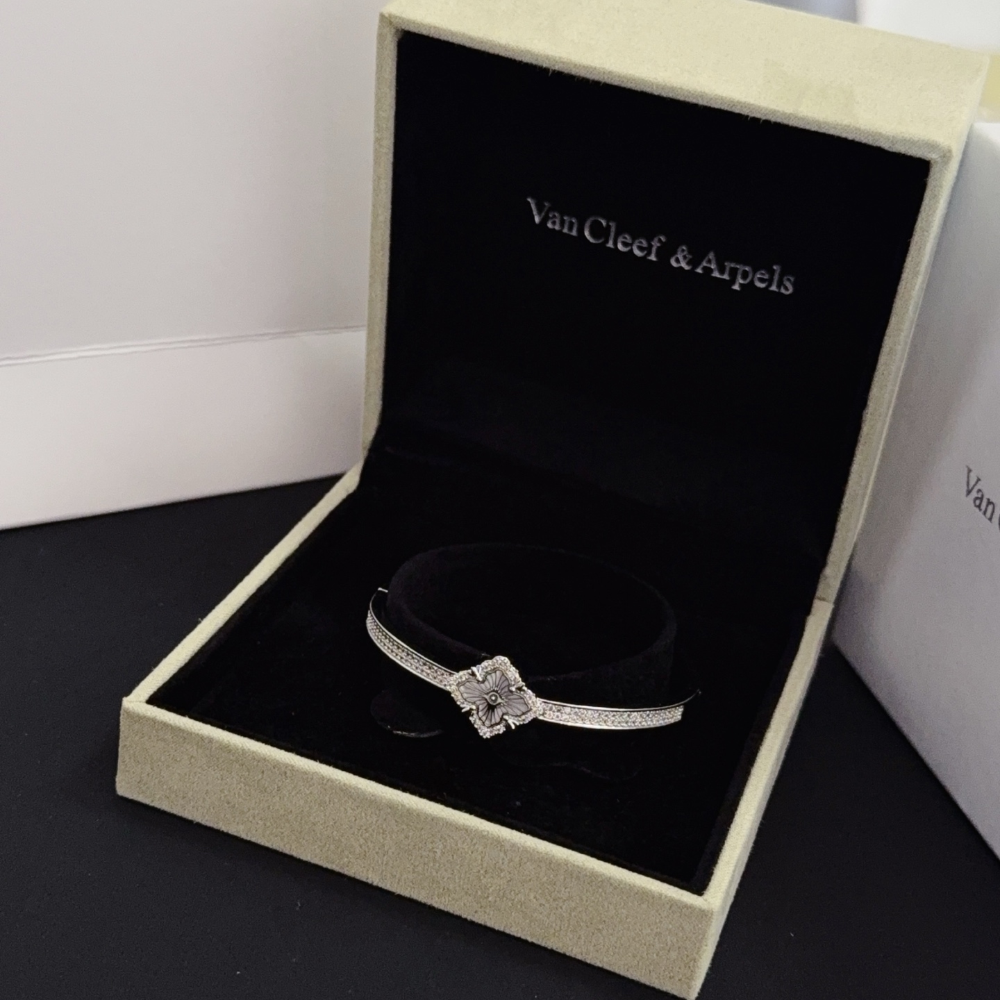 Van Cleef Arpels Alhambra bracelet silver-toned metal with clear diamond accents and silver guilloche clover motif 17cm