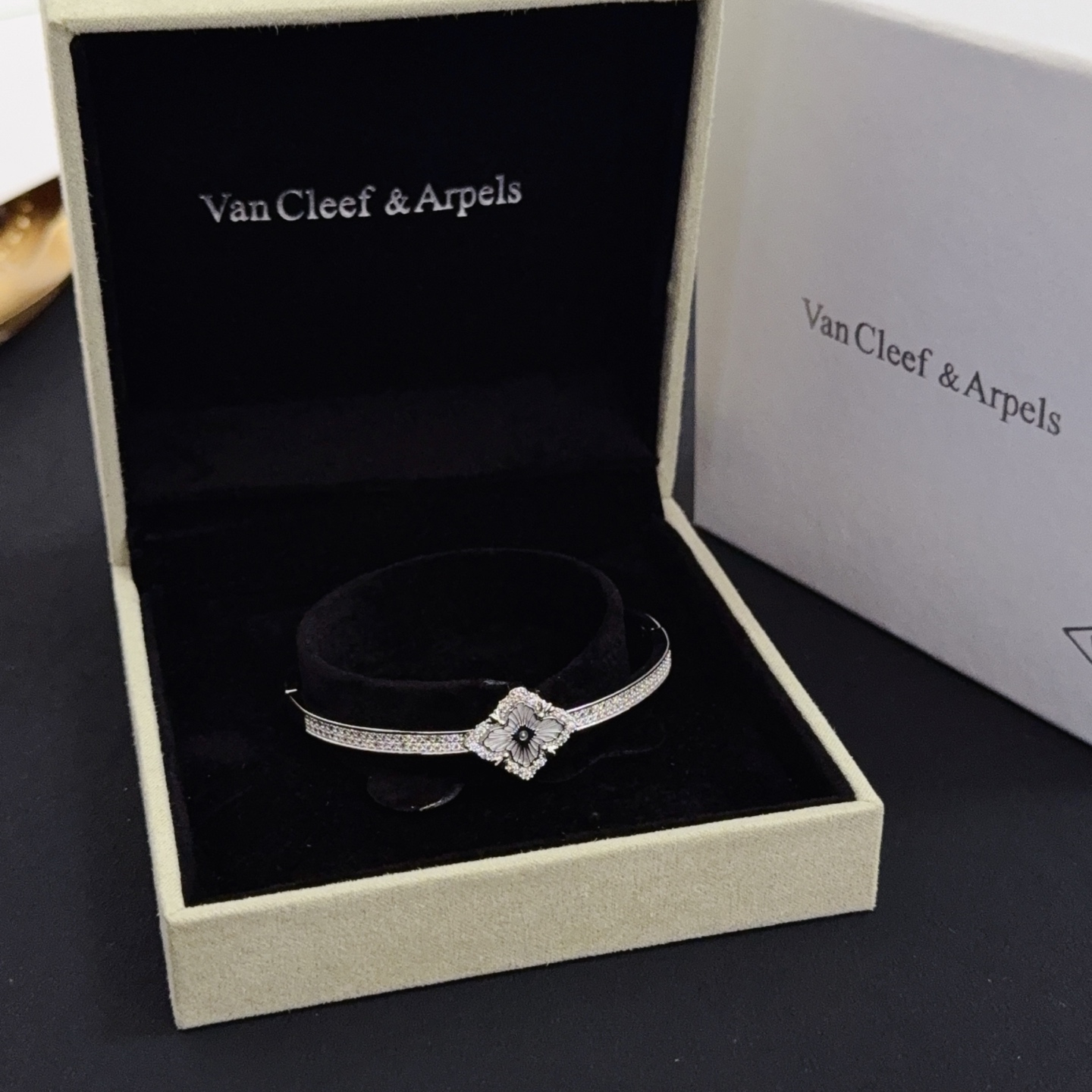 Van Cleef Arpels Alhambra bracelet silver-toned metal with clear diamond accents and silver guilloche clover motif 17cm