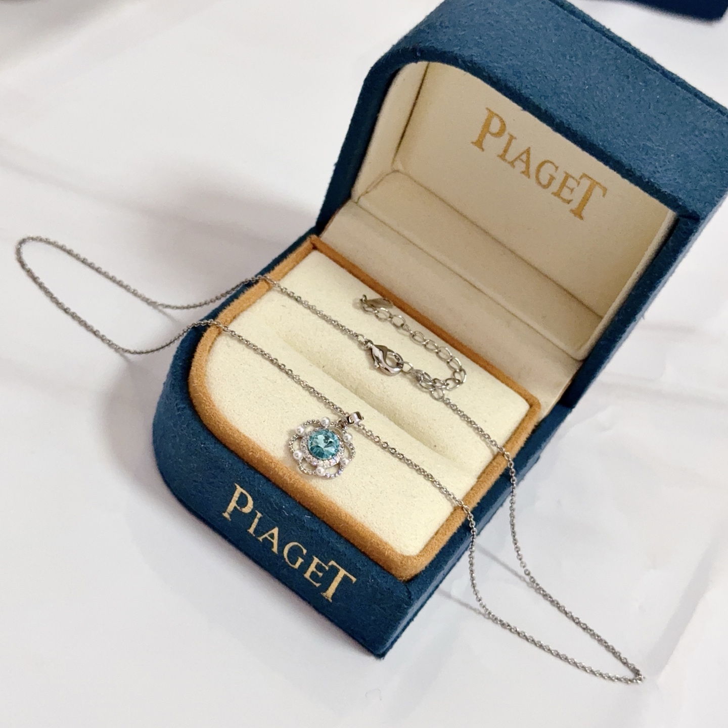 Piaget Rose necklace silver-toned metal sky blue gemstone clear diamond accents white pearl accents 42cm